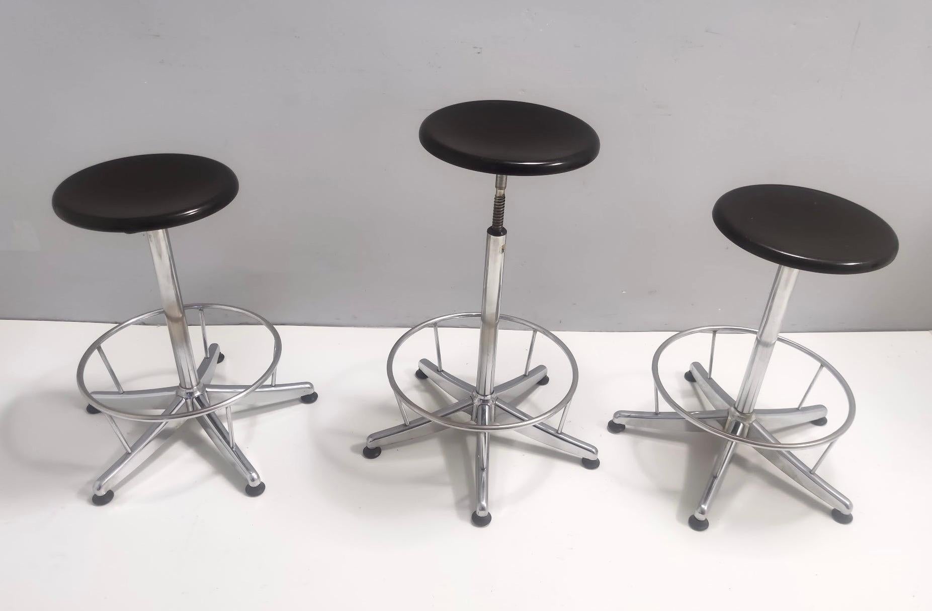 Made in Italy, 1960s. 
These stools feature a chrome-plated metal frame and a black plastic seat. 
They were in a school. 
These are vintage pieces, therefore they might show slight traces of use, but they can be considered as solid, resistant and