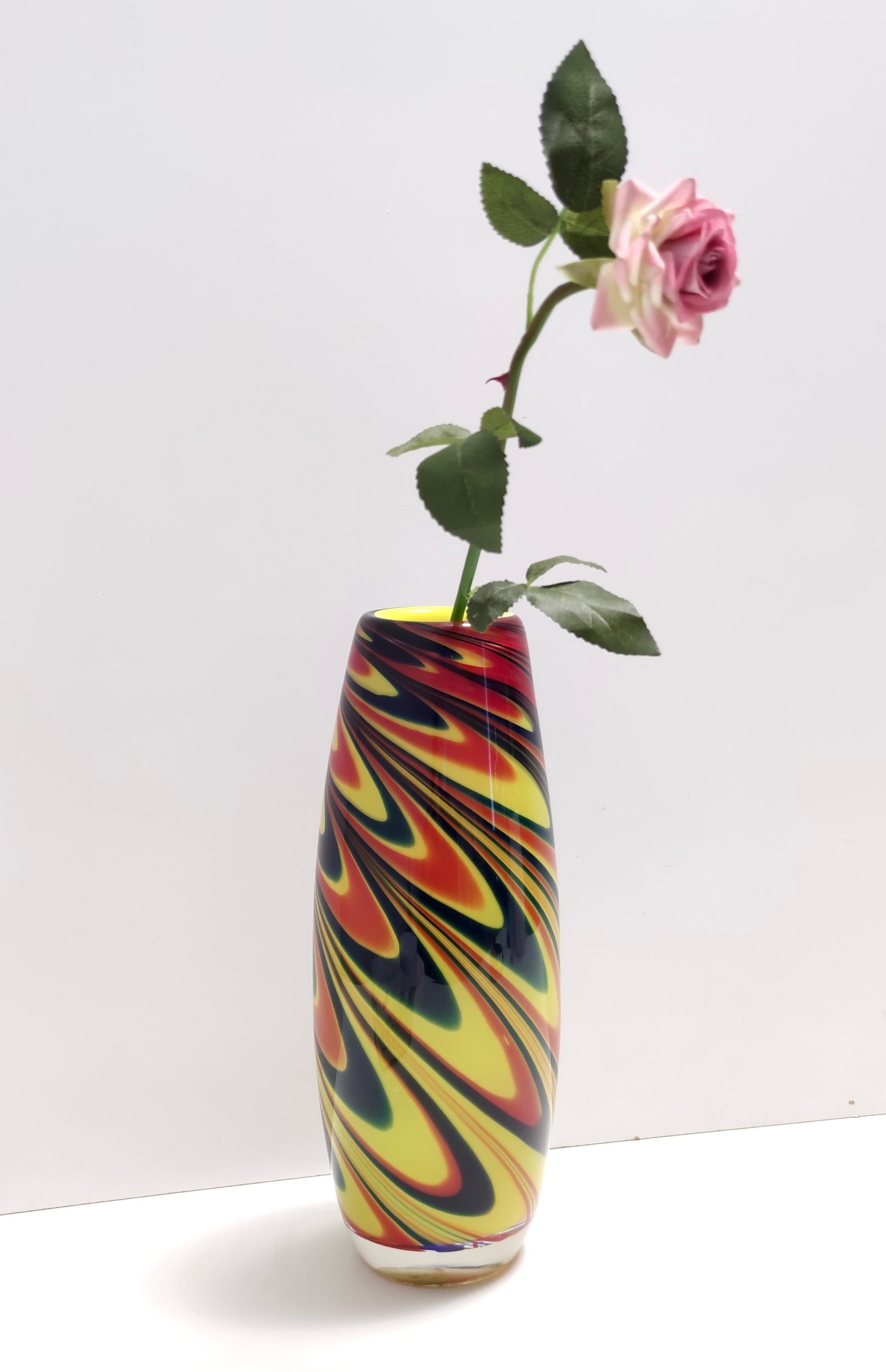 Made in Italy, 1980s.
It is made in encased and hand-blown Murano glass.
With its original label. 
This vase is vintage, therefore it might show slight traces of use, but it can be considered as in perfect original condition.

Measures:
Diameter 12