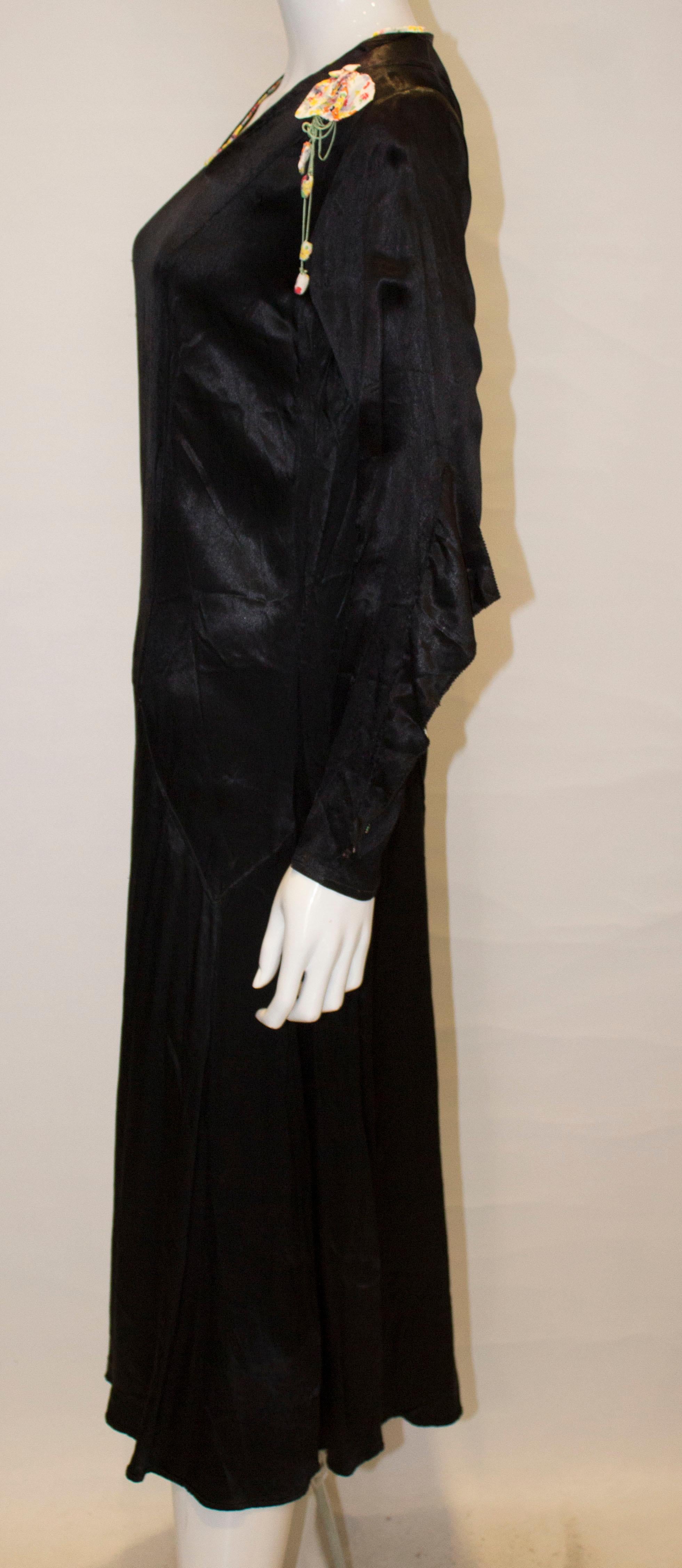 Vintage Black Satin 1920s dress with floral trim For Sale 3