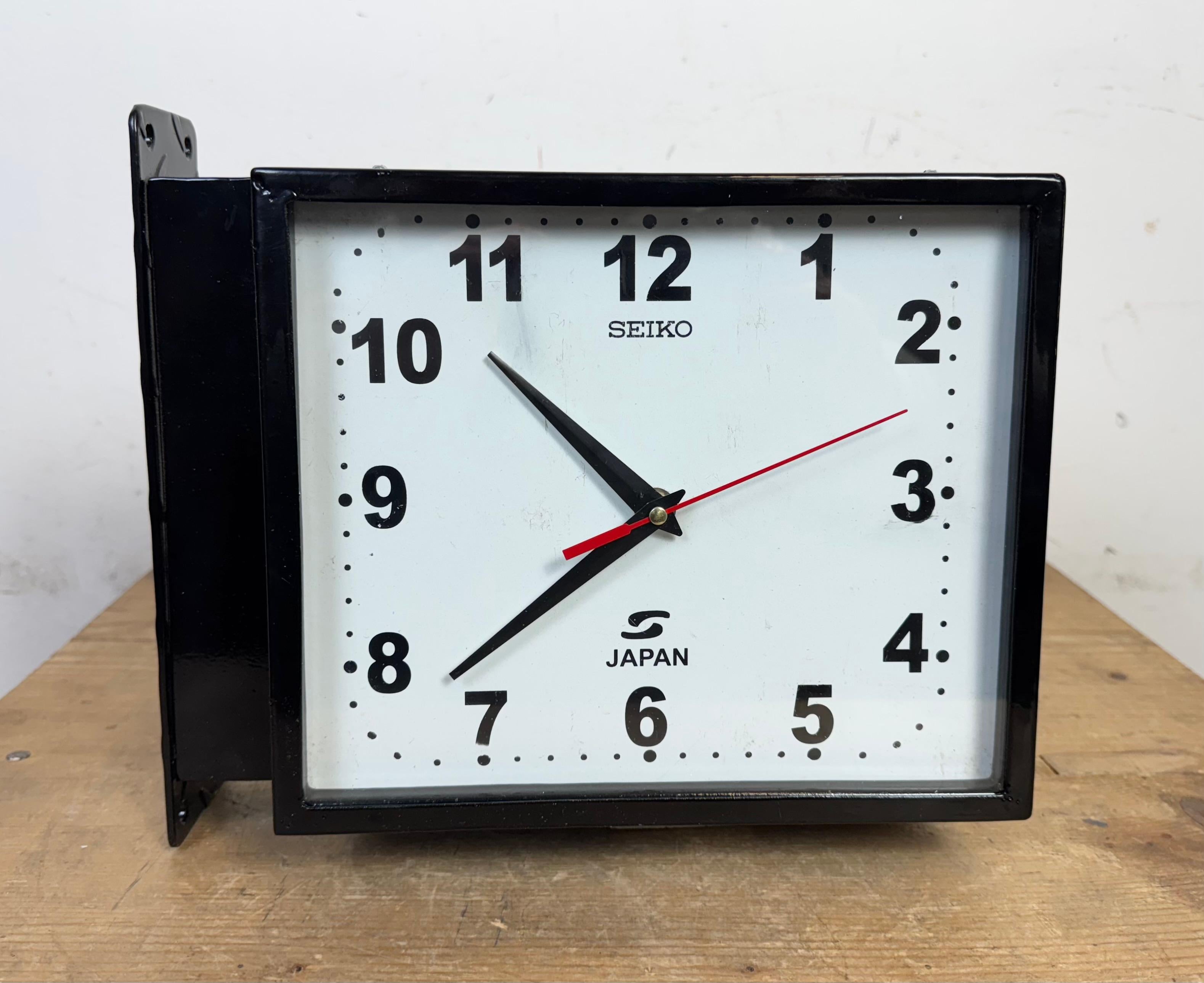Reloj de pared vintage Seiko Maritime negro de doble cara, años 1970 finales del siglo XX