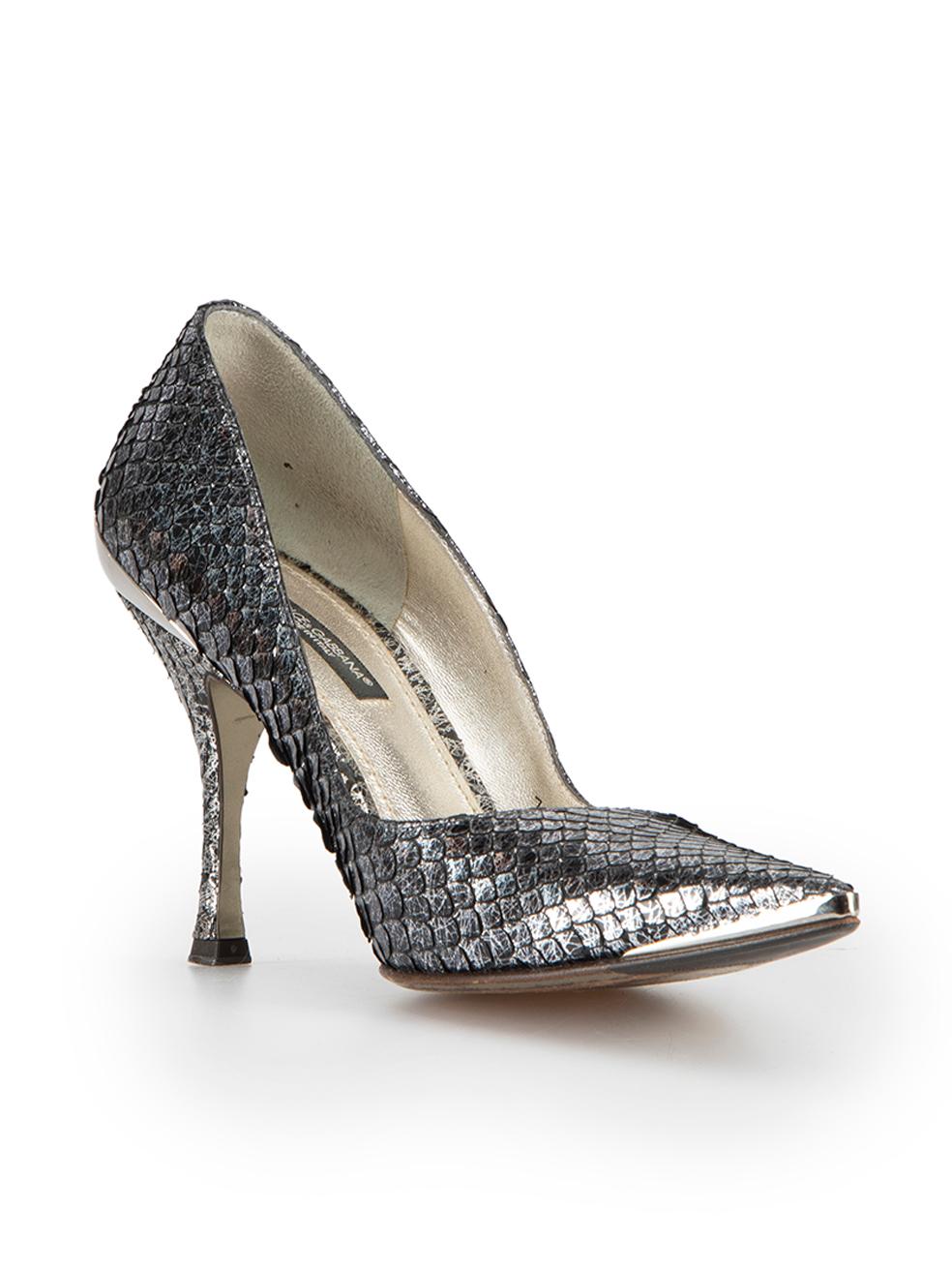 CONDITION is Very good. Minimal wear to shoes is evident. Minimal wear to both footbeds and heels with scuffing on this used Dolce & Gabbana designer resale item.



Details


Black and silver

Snakeskin

Slip-on heels

Pointed-toe

Mirror back heel