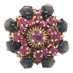 Bague vintage en or jaune 18 carats avec saphirs noirs étoilés et rubis
