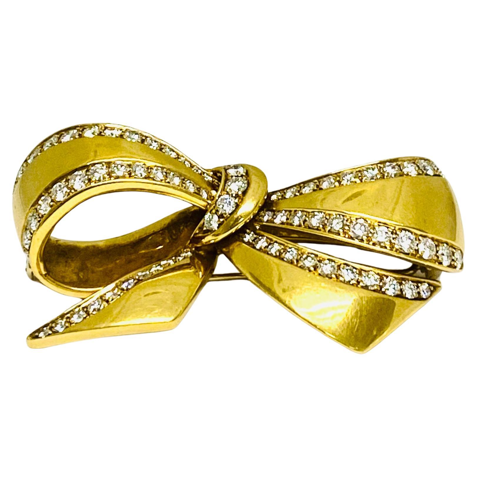 Round Cut Vintage Black, Starr & Frost 18k Gold Diamond Bow Brooch For Sale