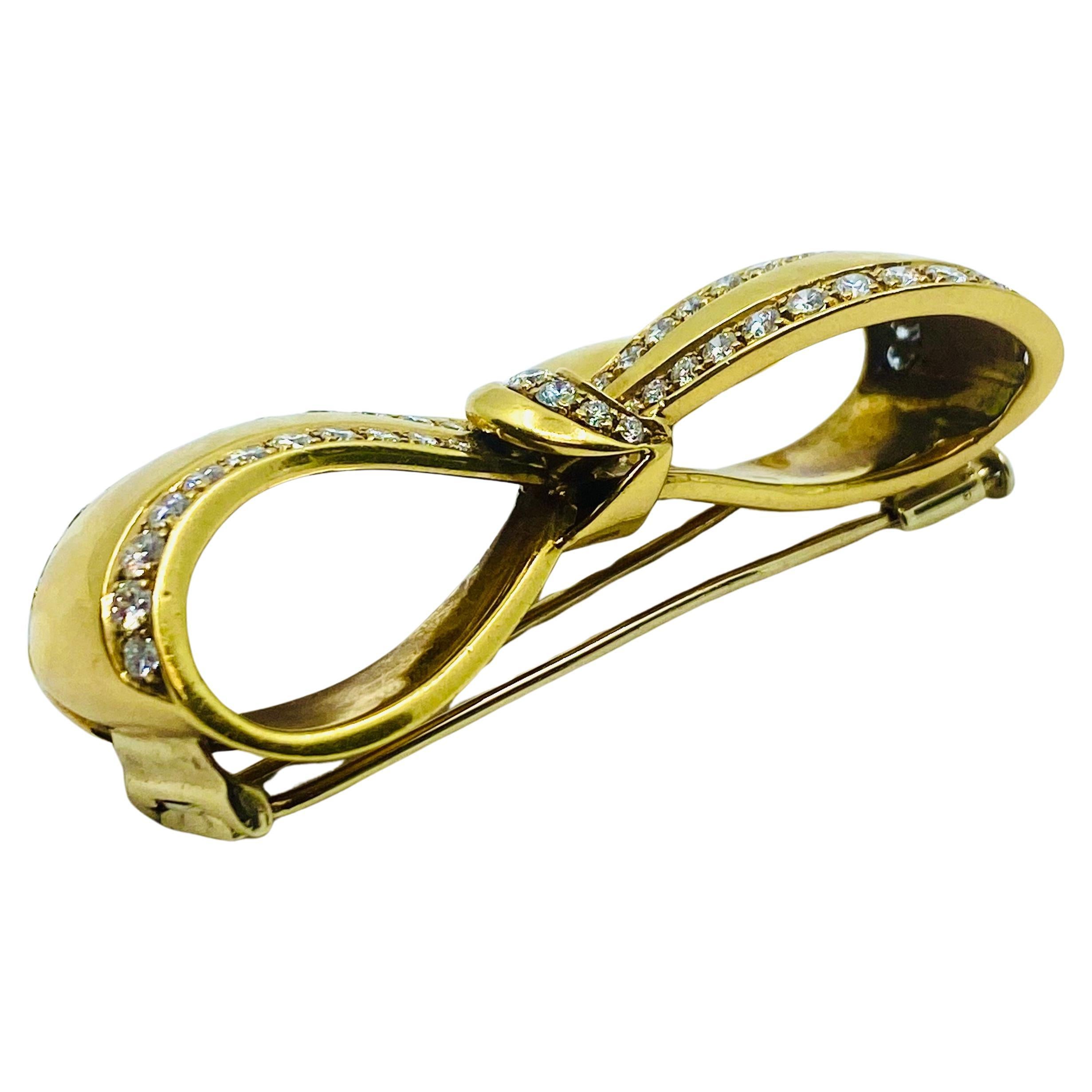 Vintage Black, Starr & Frost 18k Gold Diamond Bow Brooch In Excellent Condition For Sale In Beverly Hills, CA