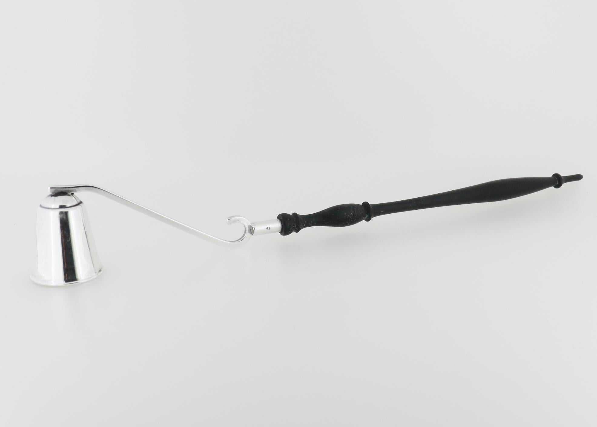 A fine vintage American Mid-Century candle snuffer.

By Black, Starr & Gorham.

In sterling silver.

With an ebony wood handle.

Marked to the neck for Sterling / Black, Starr, Gorham / 61.

Simply a wonderful Mid-Century candle