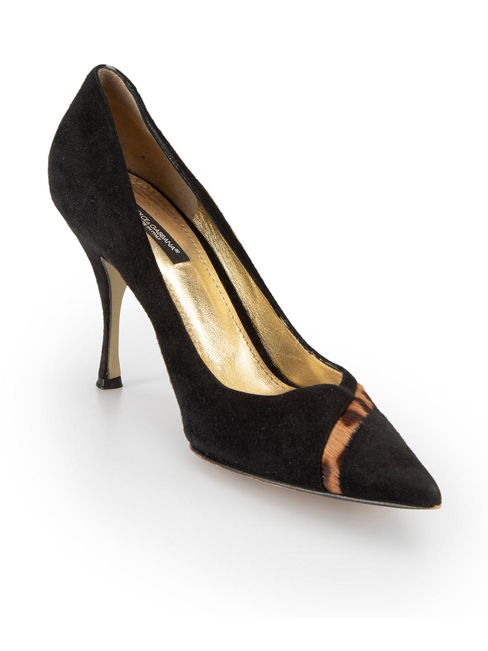 CONDITION is Very good. Minimal wear to shoes is evident. Minimal wear to both heels and the right-side of the left shoe with scuffs on this used Dolce & Gabbana designer resale item. 



Details


Black and brown

Suede and pony hair calfskin

Slip