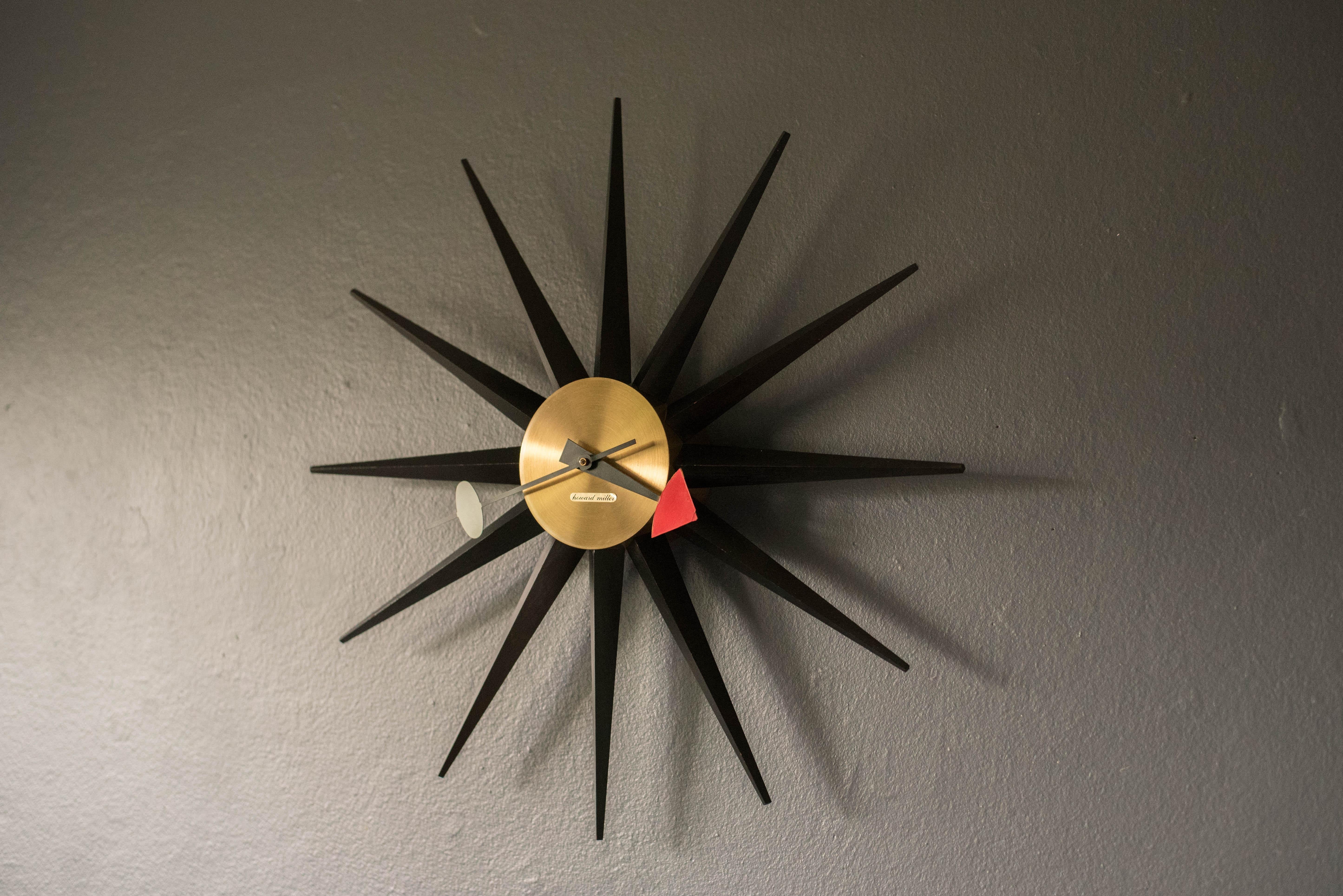 Scandinavian Modern Vintage Black Sunburst Wall Clock by George Nelson for Howard Miller For Sale