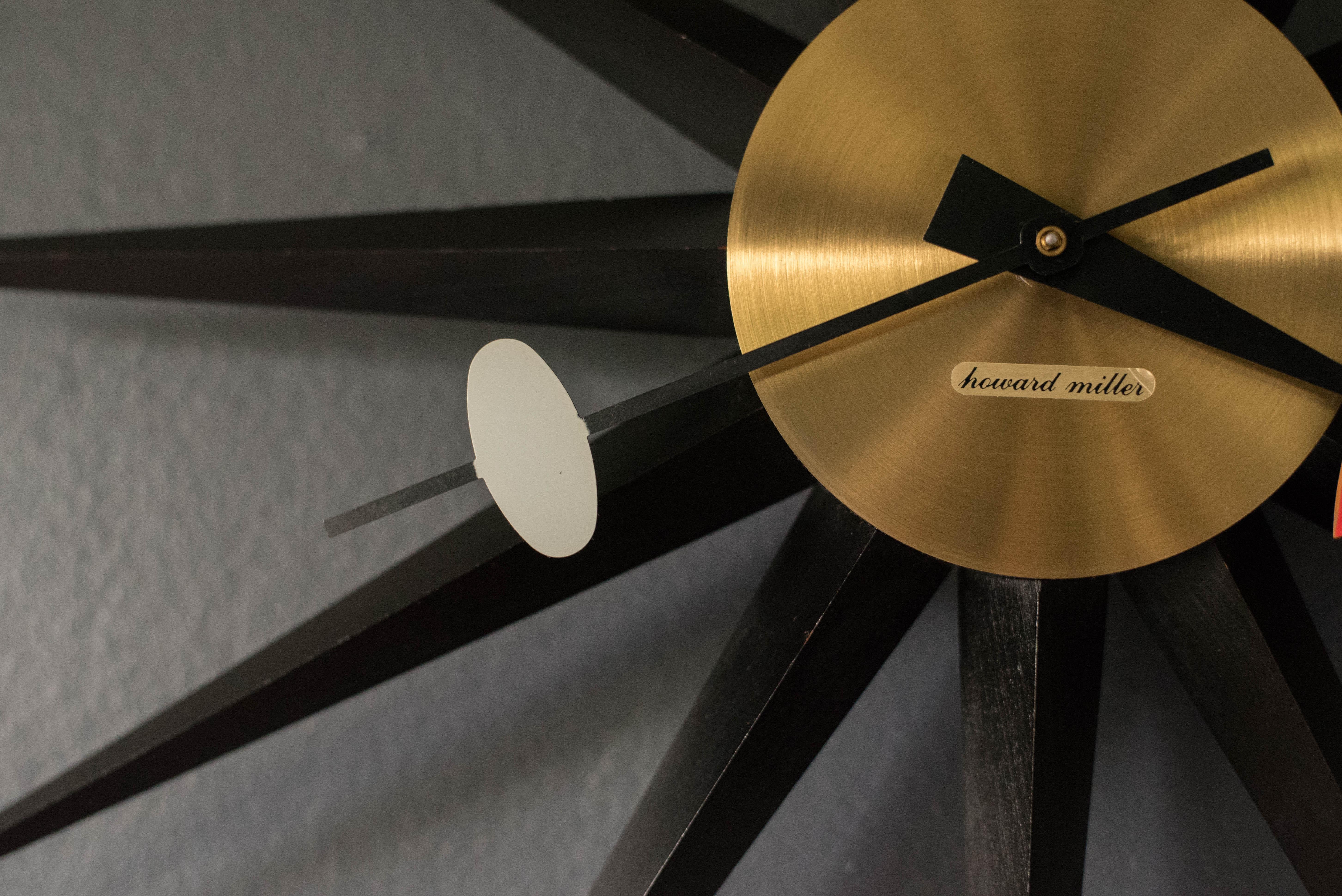 Brass Vintage Black Sunburst Wall Clock by George Nelson for Howard Miller For Sale