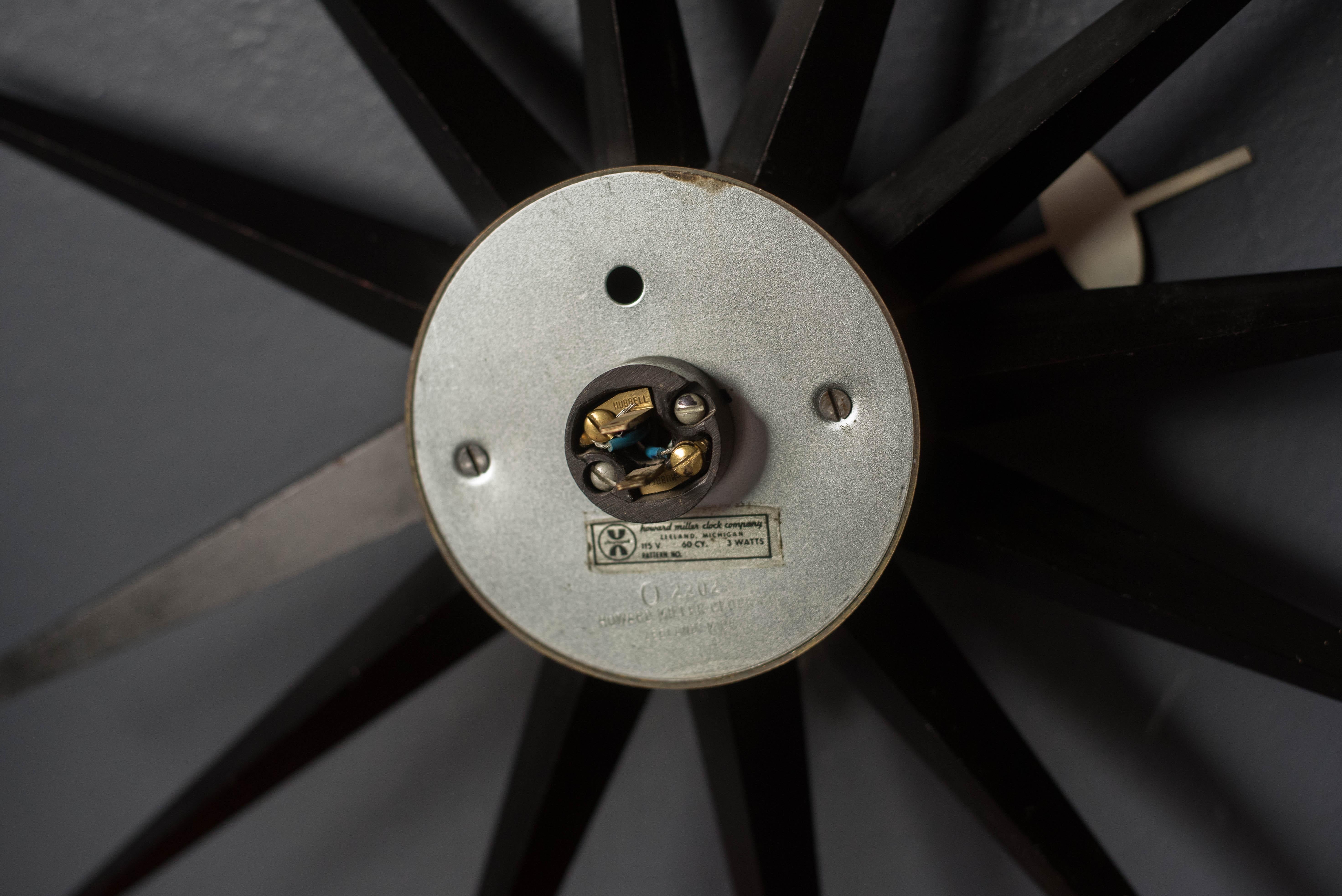 Vintage Black Sunburst Wall Clock by George Nelson for Howard Miller For Sale 1