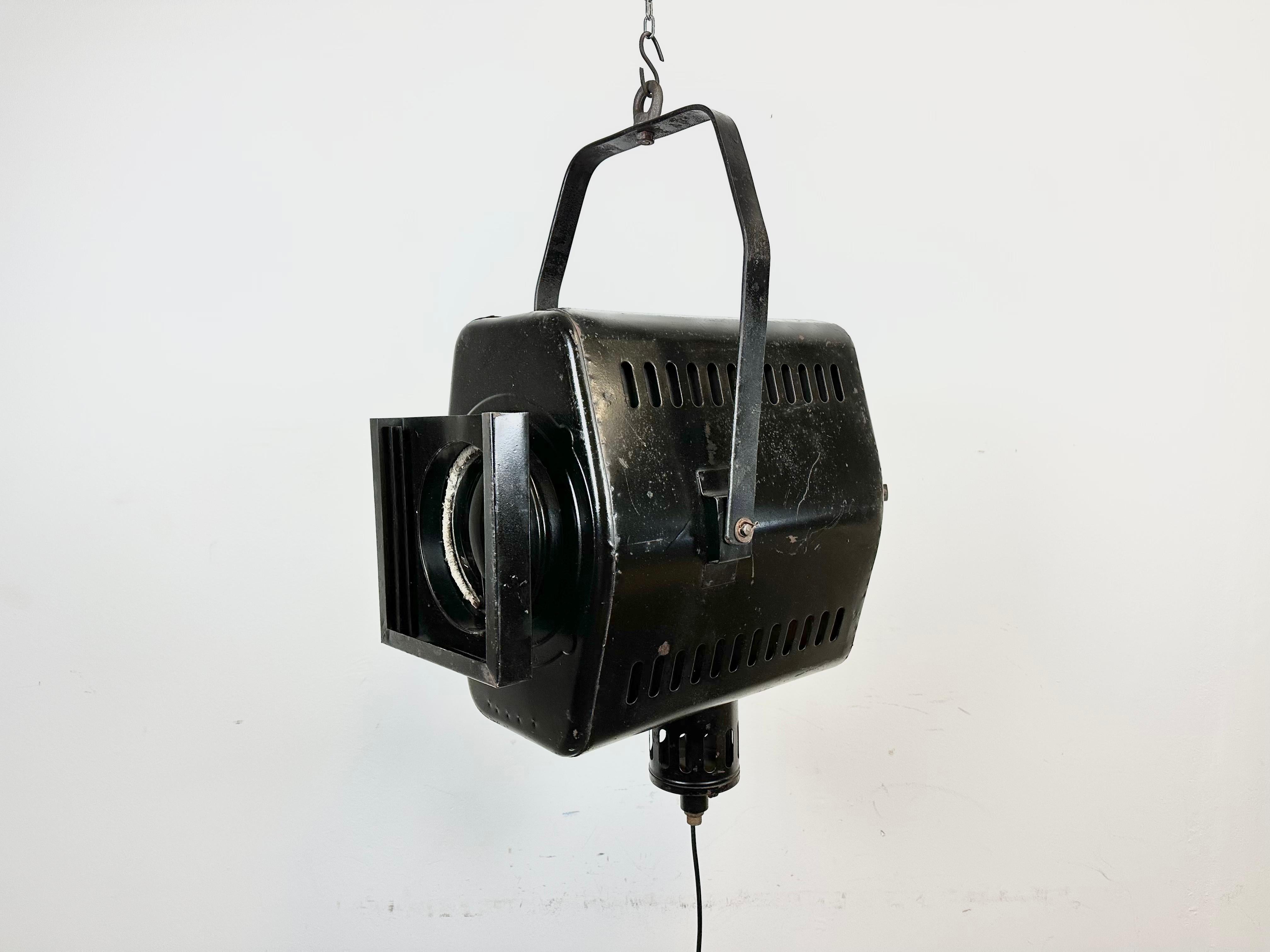 - Vintage theatre spotlight made in former Czechoslovakia during the 1950s 
- It features a black metal body and clear glass lens cover
- The porcelain socket requires E27/ E26 lightbulbs 
- New wire
-The height of the spotlight is 50 cm. With