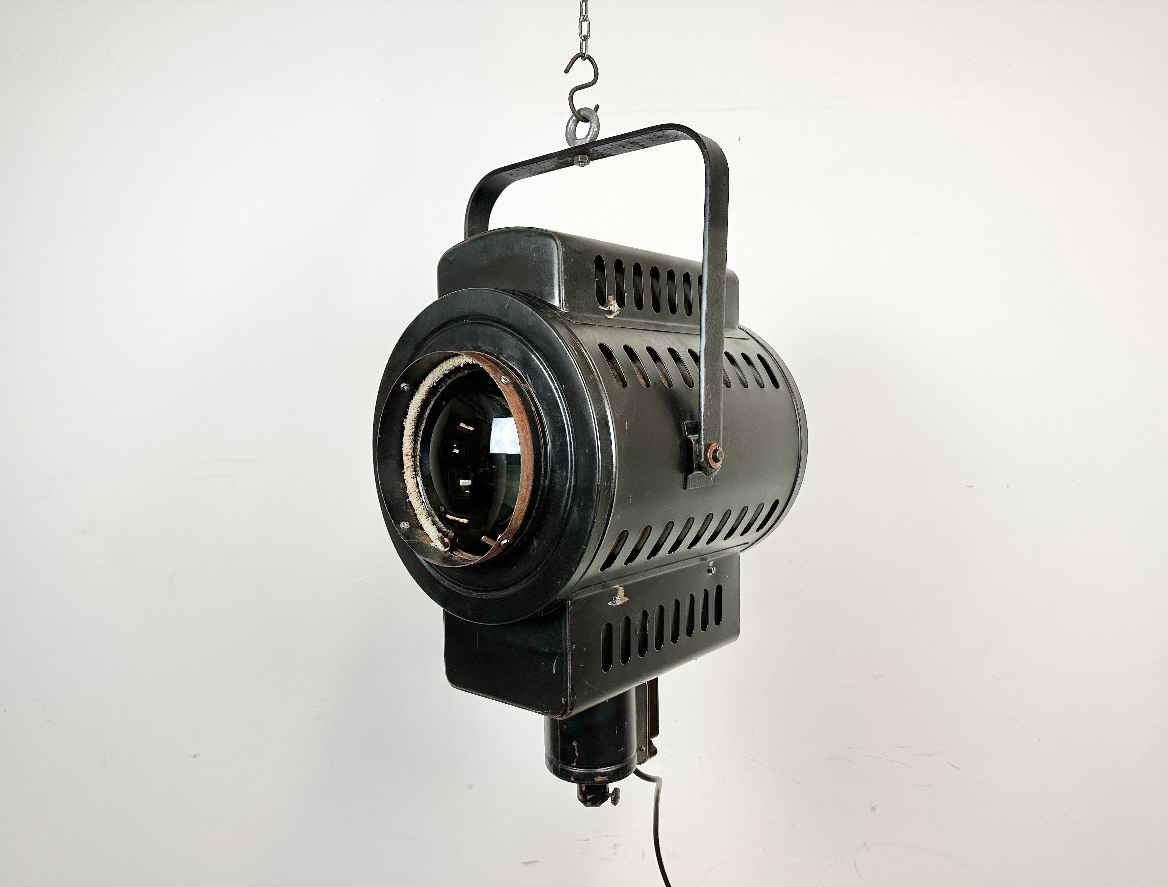 - Vintage theatre spotlight made in former Czechoslovakia during the 1960s 
- It features a black metal body and clear glass lens cover
- The porcelain socket requires E27/ E26 lightbulbs 
- New wire
-The height of the spotlight is 50 cm. With