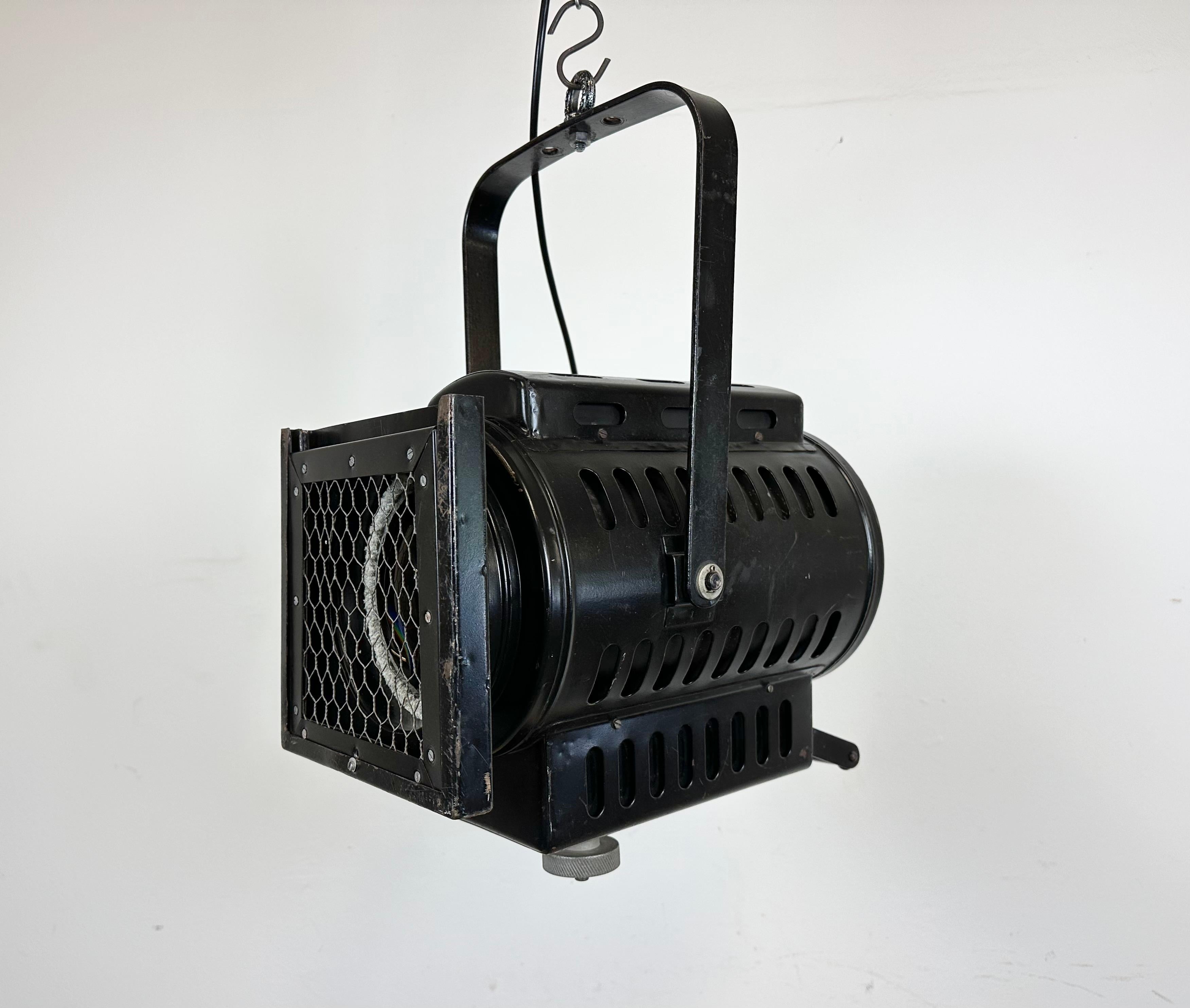 - Vintage theatre spotlight made in former Czechoslovakia during the 1960s 
- It features a black metal body and clear glass lens cover
- Iron grid
- The porcelain socket requires standard E27/ E26 lightbulbs 
- New wire
-The height of the spotlight