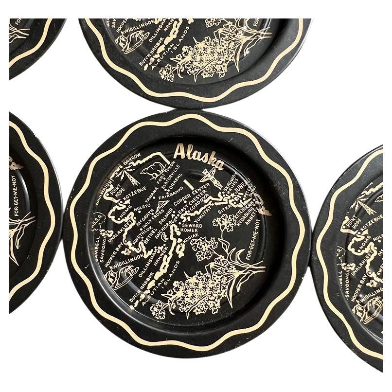 A set of six black metal tourist coasters with Alaska's most traveled areas. A great addition to your current barware!

Dimensions:
3.5