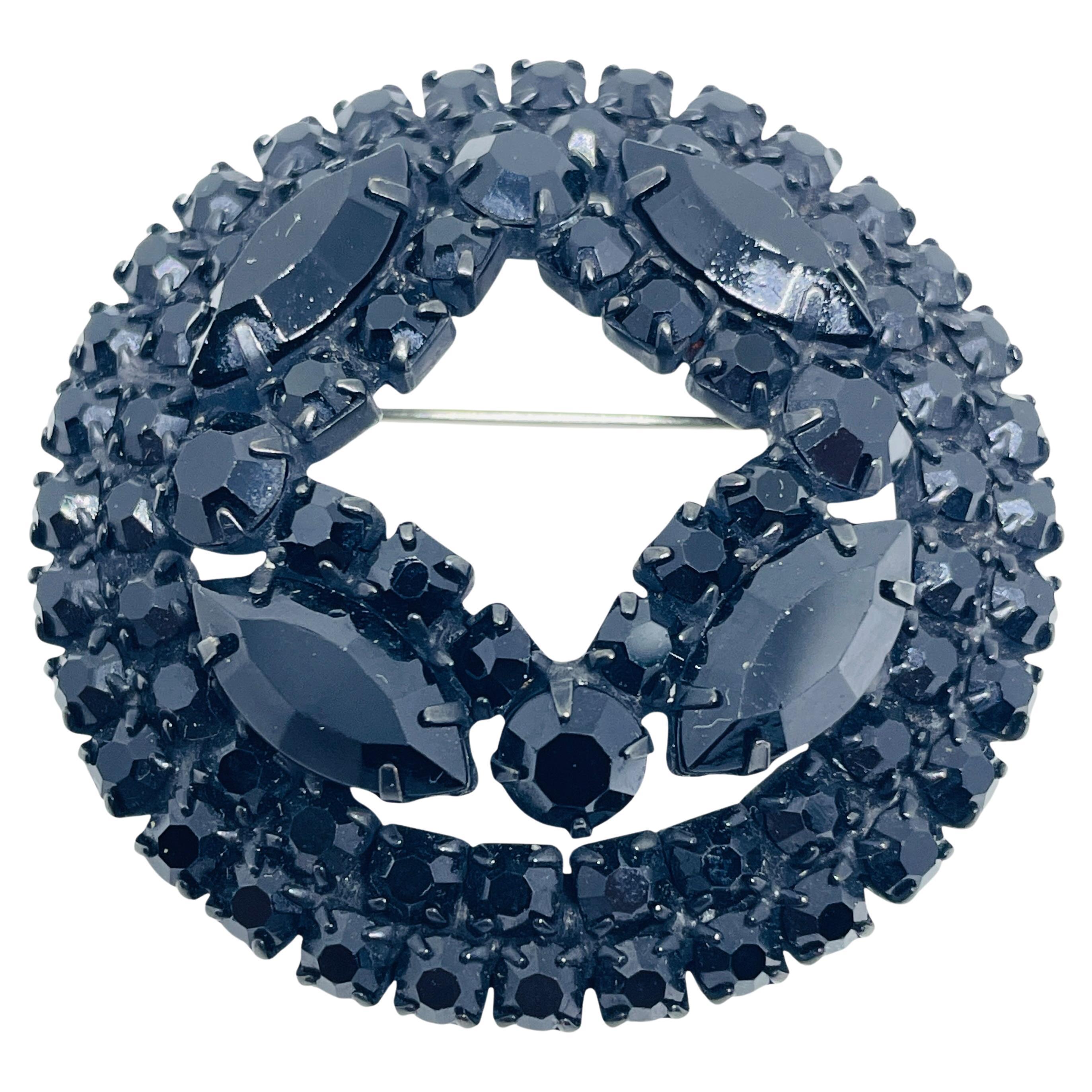 Broche vintage de designer en strass noir