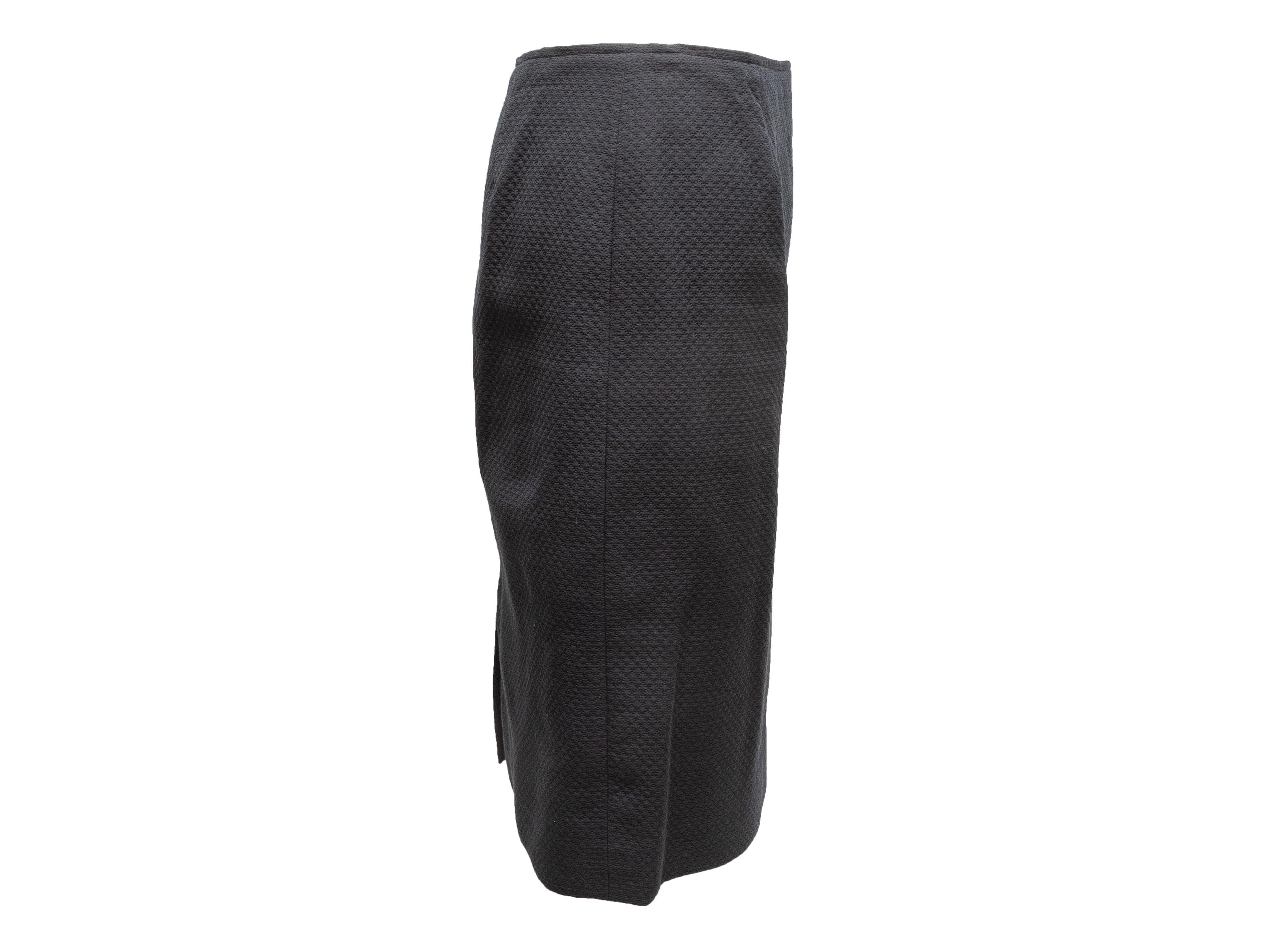 Gonna a tubino nera vintage di Vicky Tiel. Chiusura con zip laterale. Vita 32