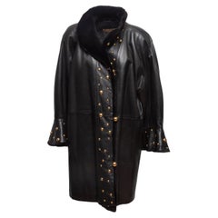 Yves Saint Laurent nero vintage anni '80 in pelle e pelliccia, taglia M. I.