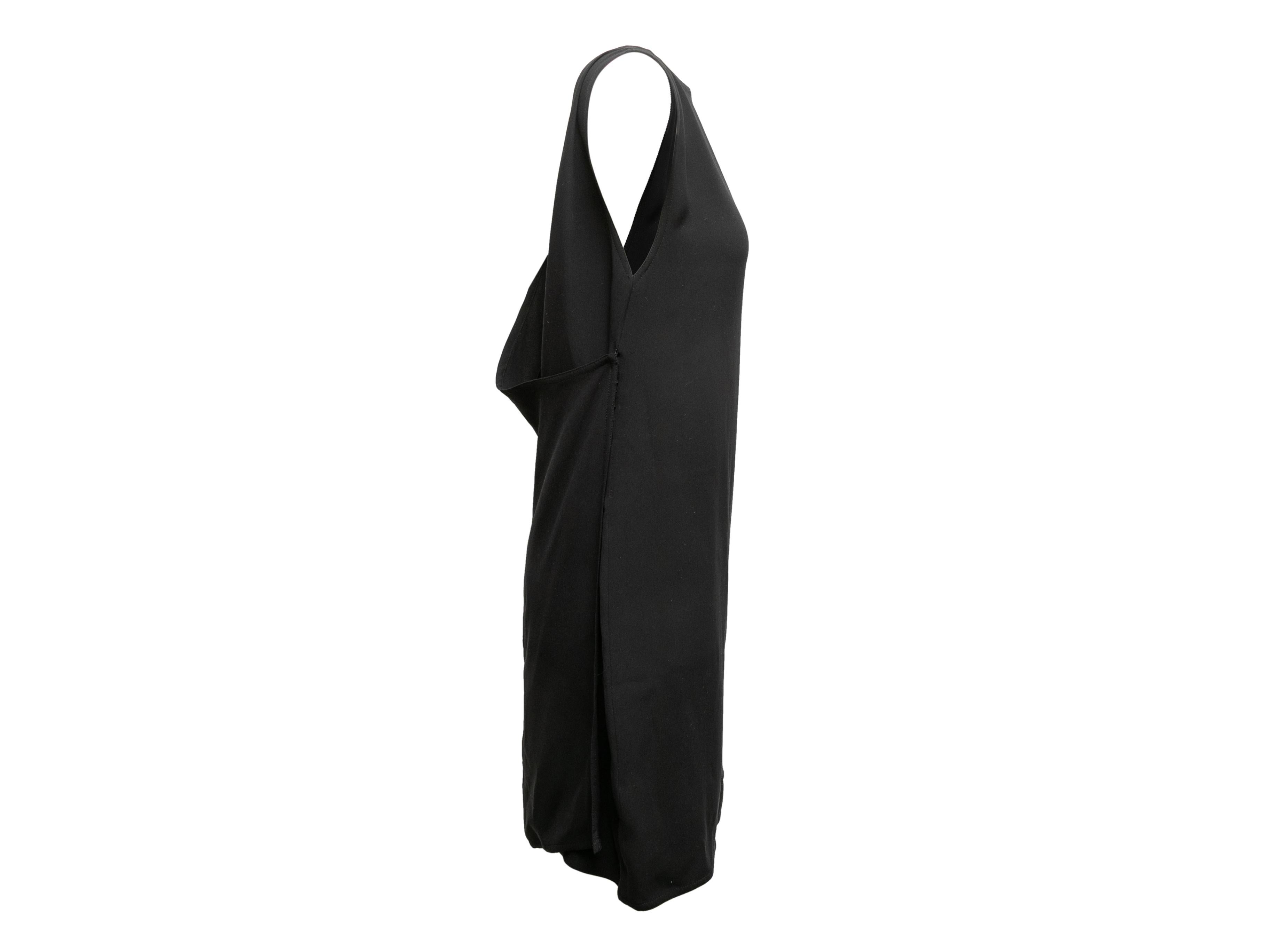 Vintage black silk sleeveless mini dress by Zoran. Bateau neckline. Draping at back. 30