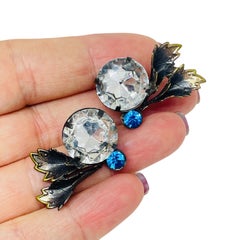 Vintage blackened gold tone clear blue glass pierced earrings