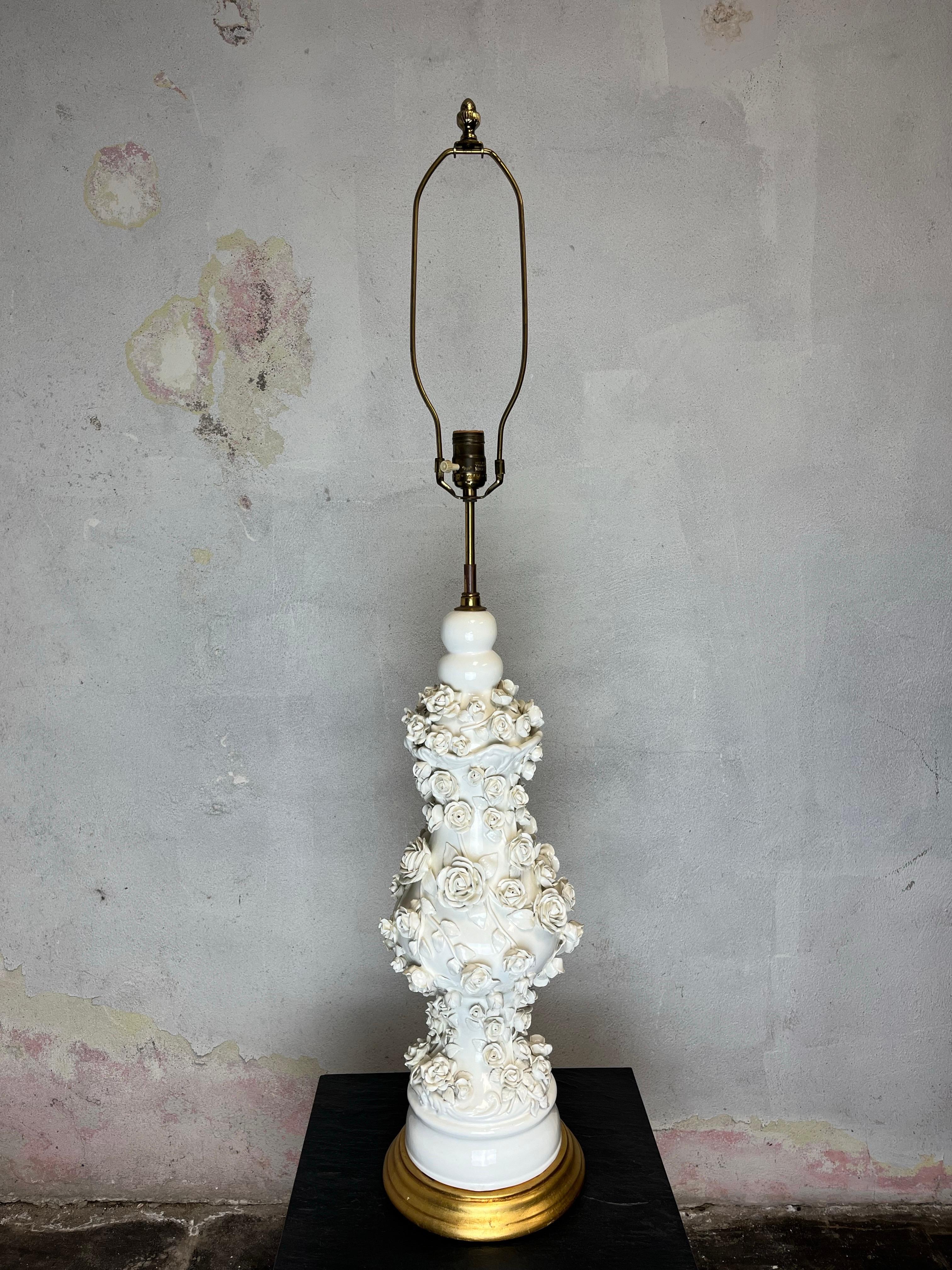 Spectacular Blanc de Chine porcelain floral vase/lamp. Beautifully designed with raised floral relief all around the lamp.  Wonderful visual and craftsmanship. 
31.5