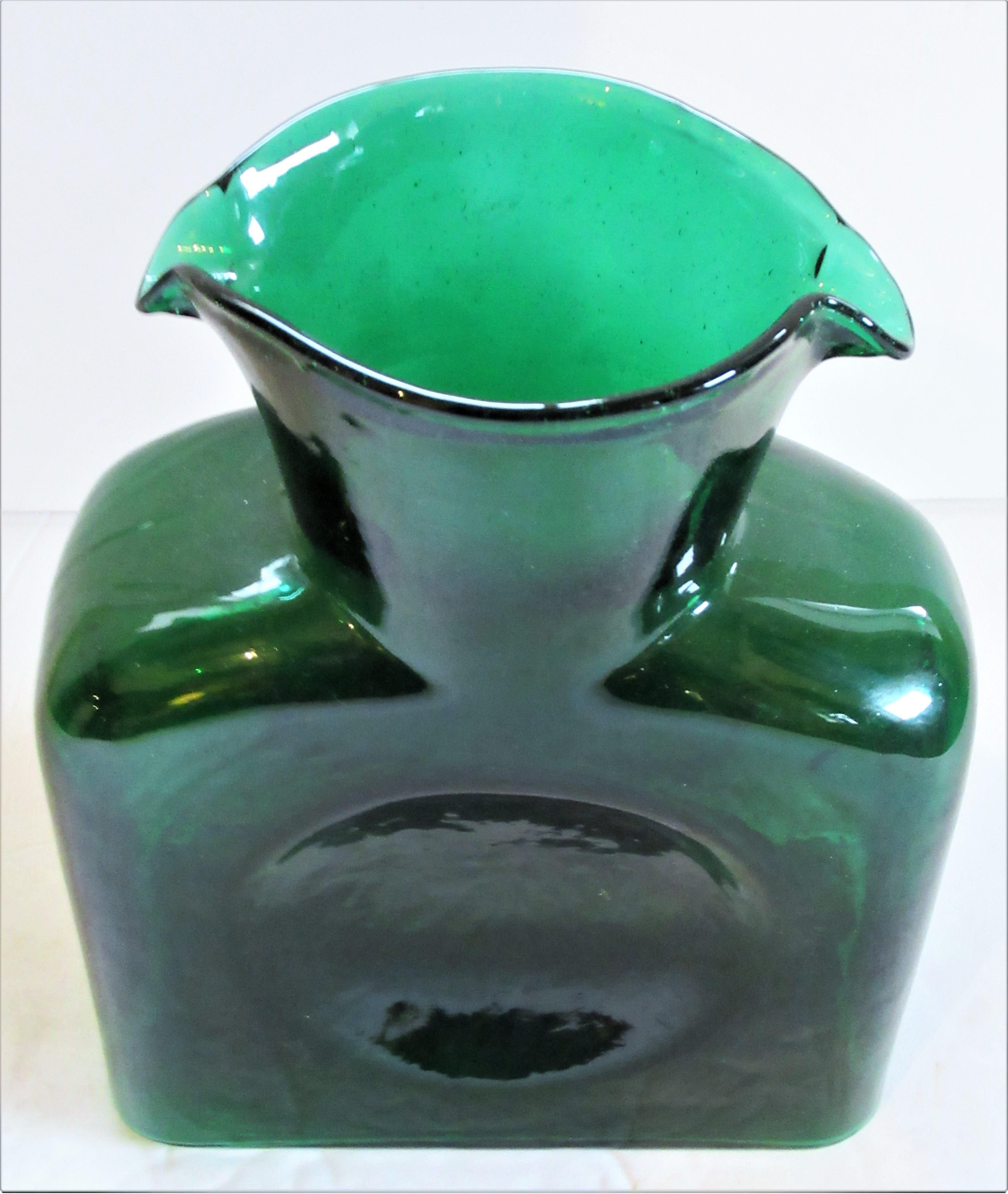 Beautiful glowing emerald green glass vintage double spout water bottle decanter by Blenko. Look at all pictures and read condition.