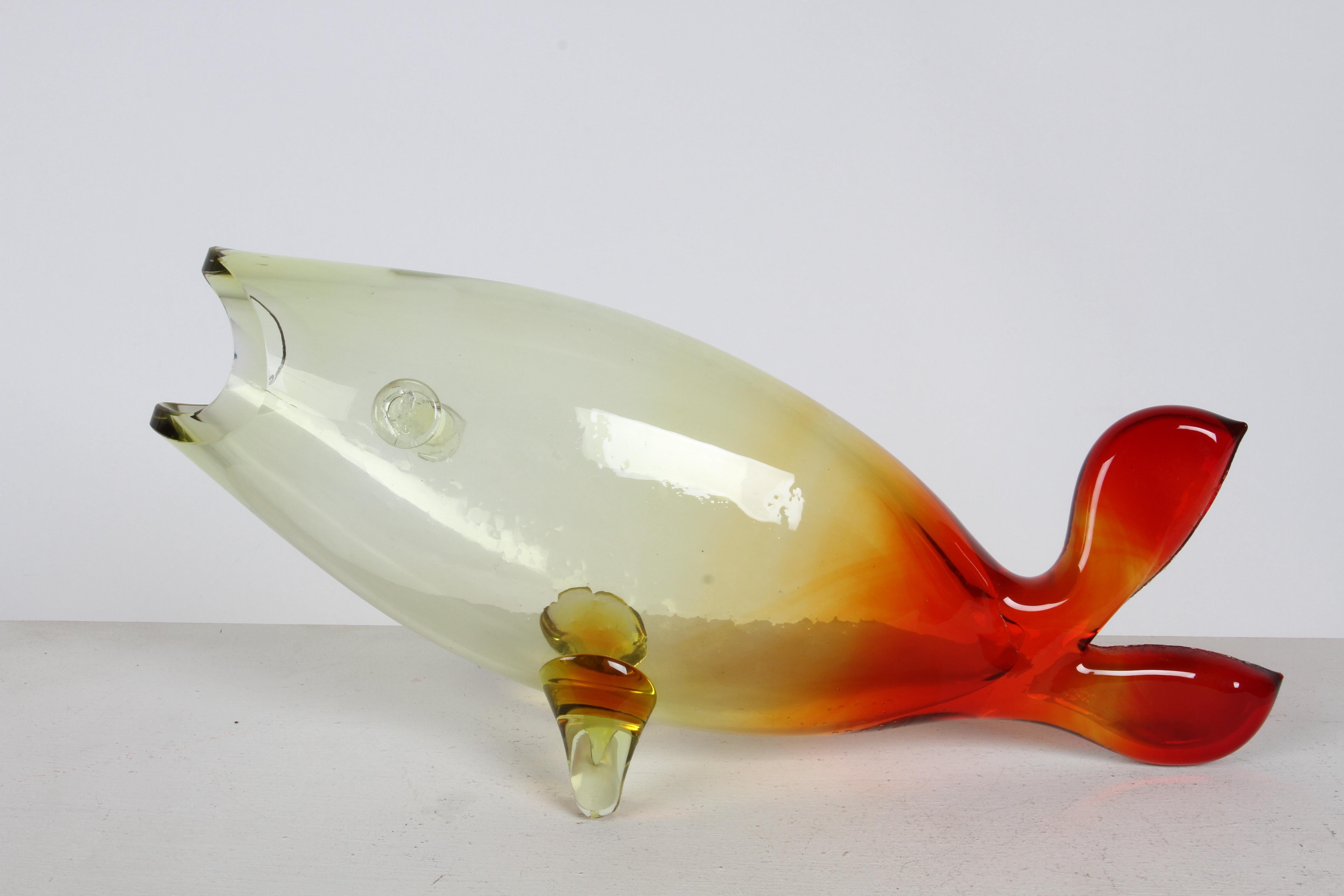 Vintage Mid-Century Modern large scale Blenko sculptural fish vase designed by Winslow Anderson, hand blown glass that fades yellow to red. Blenko model #971, in fine condition, one small interior scratch as seen in photo. 