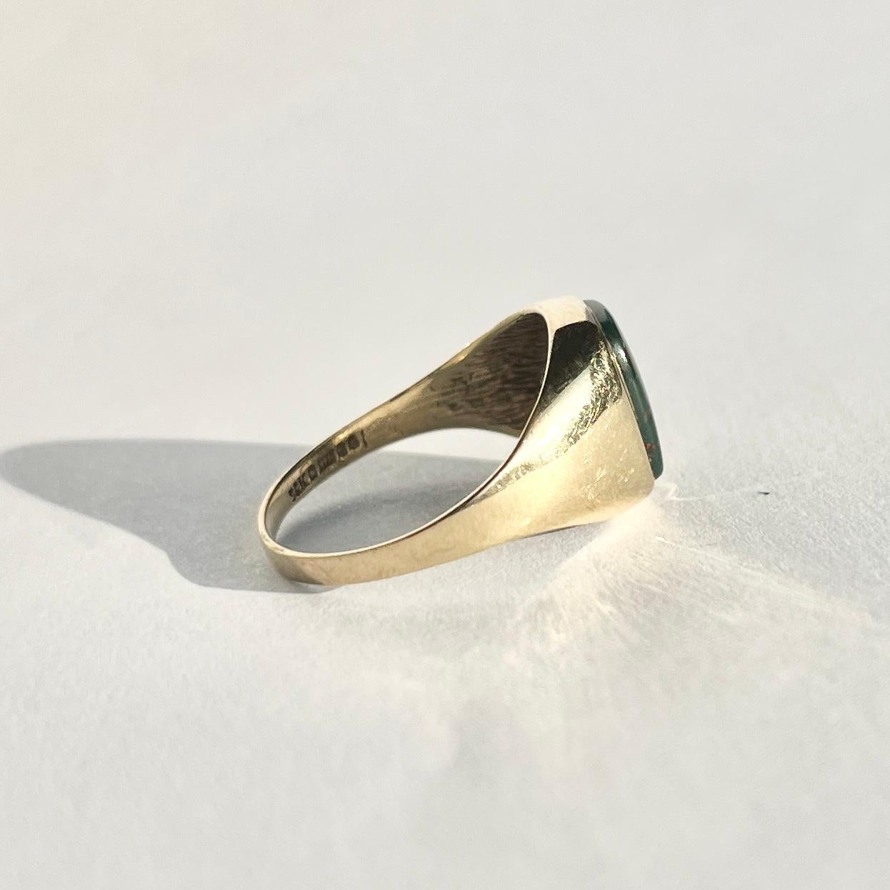 This gorgeous signet ring has a bloodstone set within the 9carat gold band. The stone is deep green with flecks of red running through. Fully hallmarked London 1983.

Ring Size: N 1/2 or 7 
Stone dimensions: 10x8mm 

Weight: 2.5g 