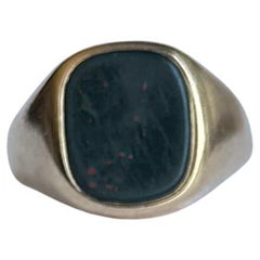 Anillo de sello vintage de piedra de sangre y oro de 9 quilates