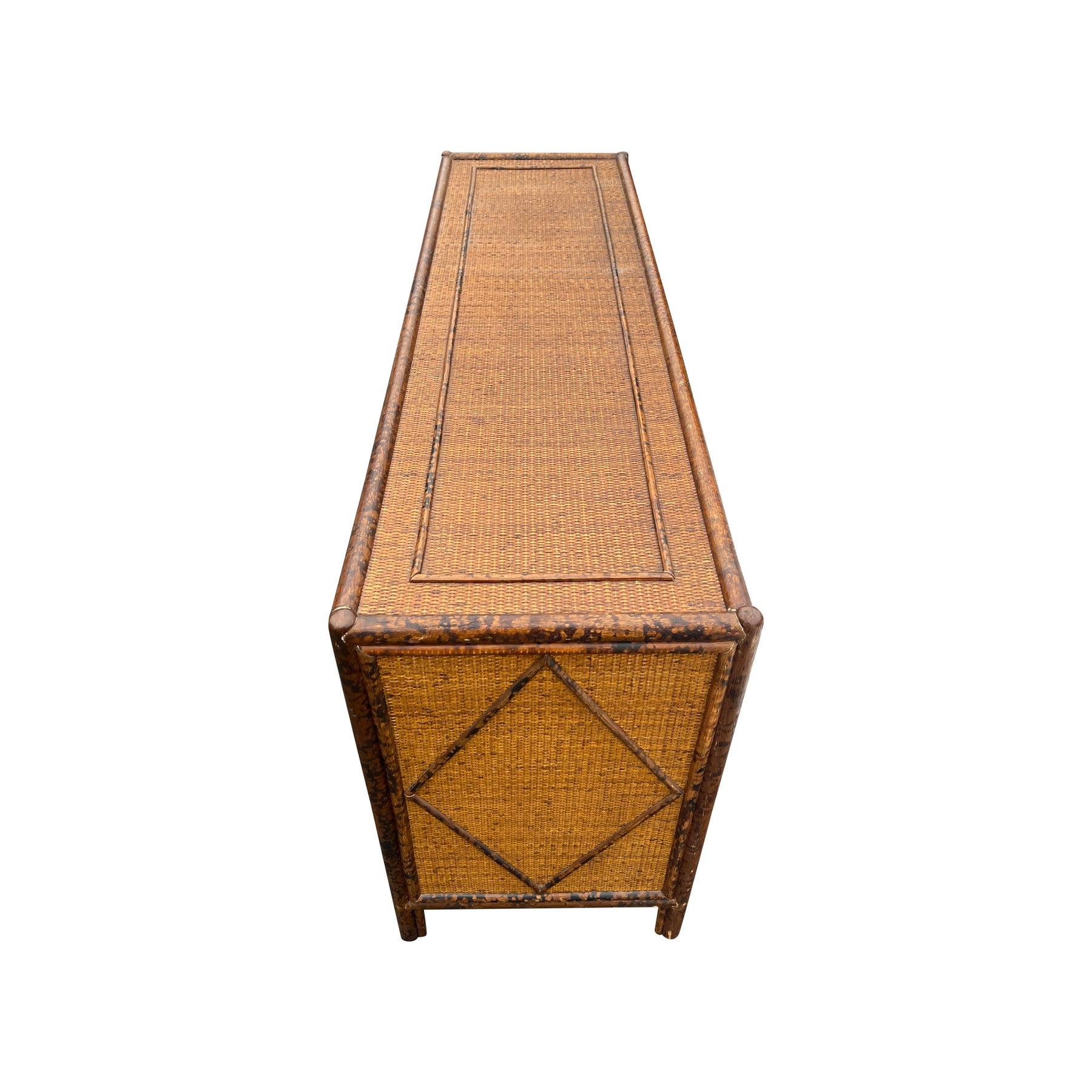 Vintage Bloomingdale's Rattan Dresser/Credenza!

This rare vintage rattan dresser, crafted for Bloomingdale's, embodies the relaxed elegance of coastal British Colonial style. Its natural wicker construction brings a touch of boho chic to any