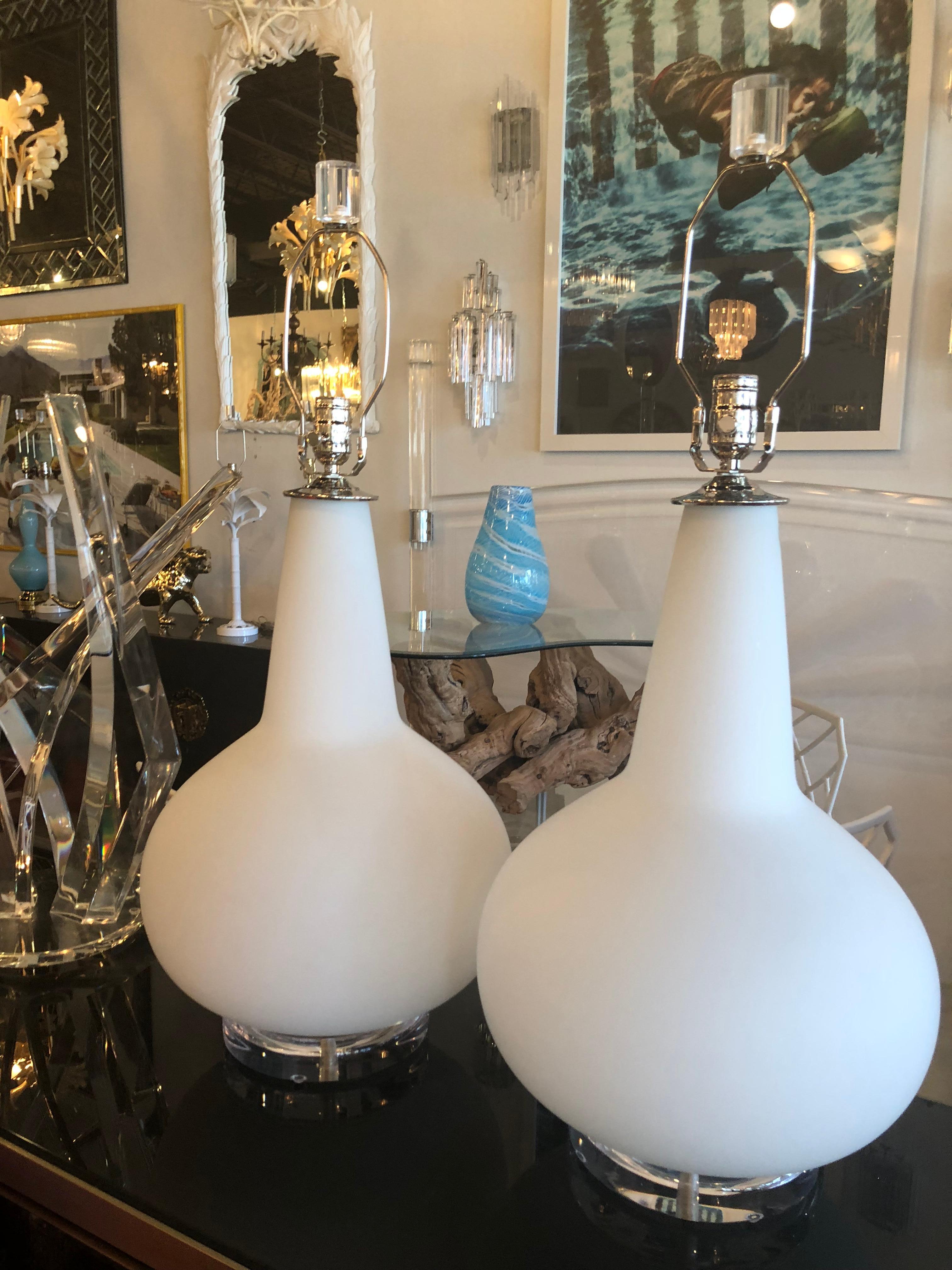 Amazing pair of vintage Italian Murano oversized table lamps, handblown. Made in Italy tag remains on lamp and can be removed by buyer. Large Lucite base, newly wired, new chrome hardware. No chips or breaks. Height to top of harp is 30.5. Lucite