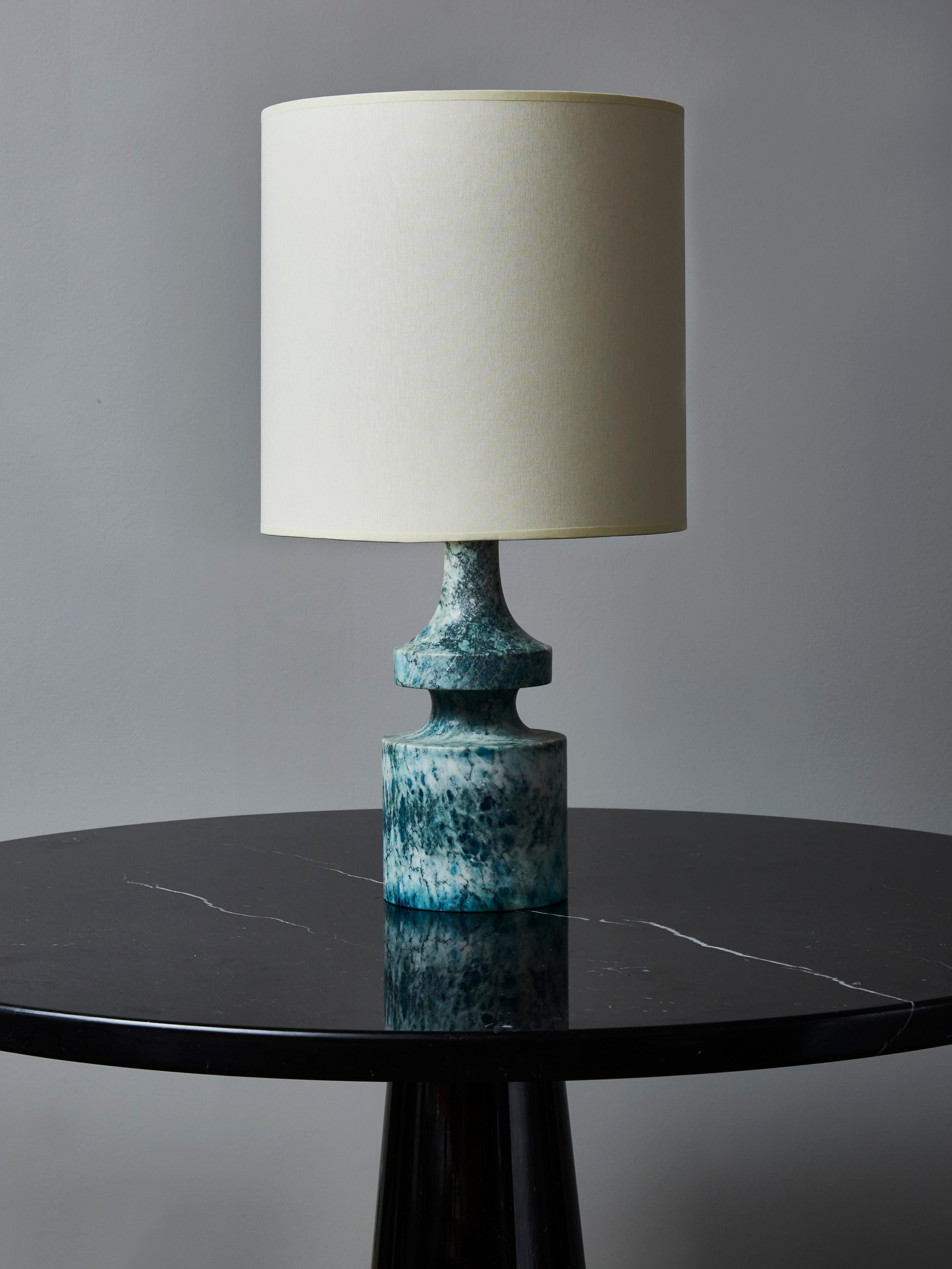 Small vintage table lamp made of a carved blue alabaster.