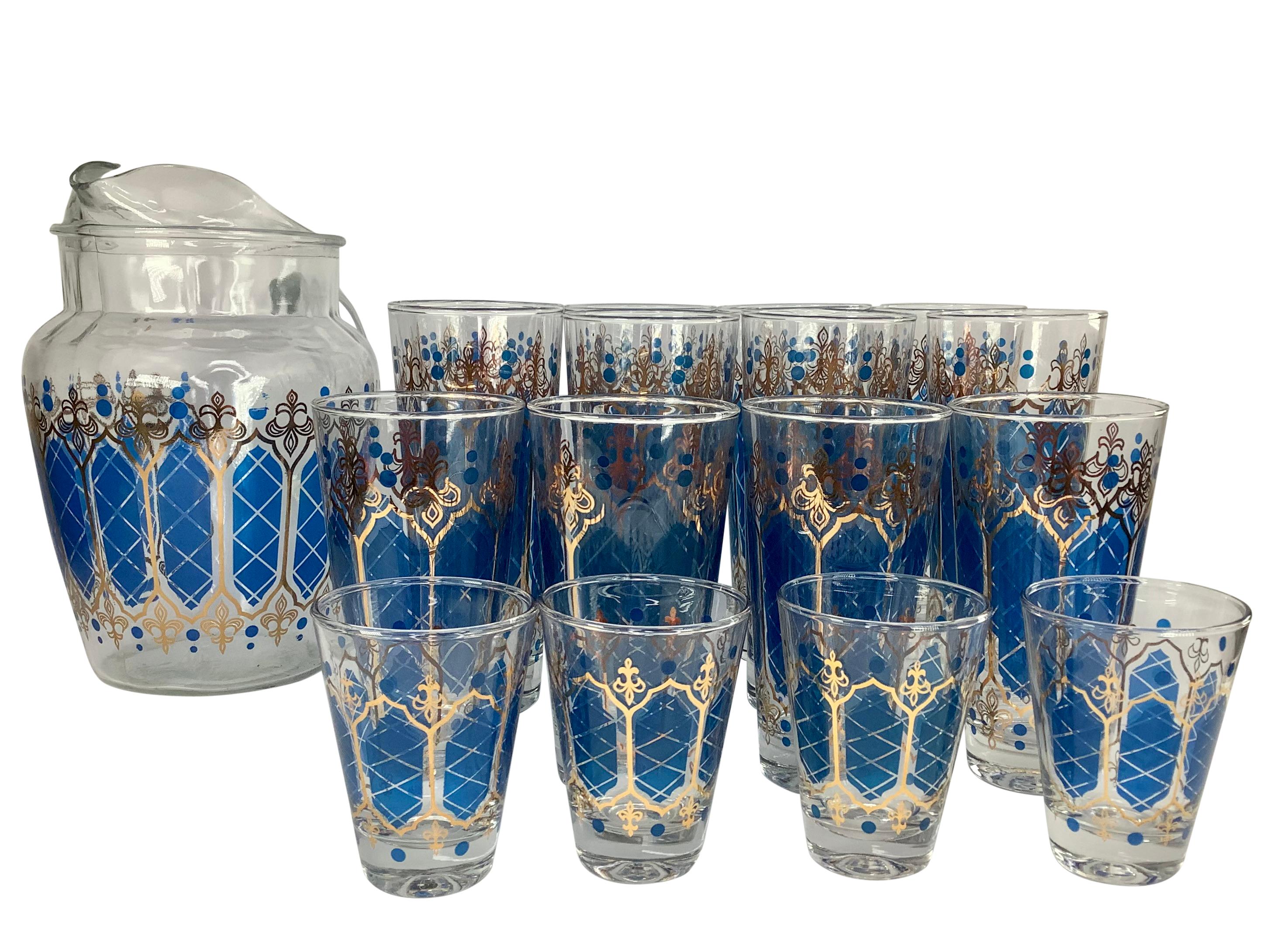 A gorgeous vintage cocktail set consisting of a Pitcher, 8 Tom Collins, 4 Highballs and 4 Old Fashioned in blue diamond pattern accented with 22k gold decoration. All the glasses are slightly tapered
Pitcher 7”w x 8”h
Tom Collins 2 7/8” x 6