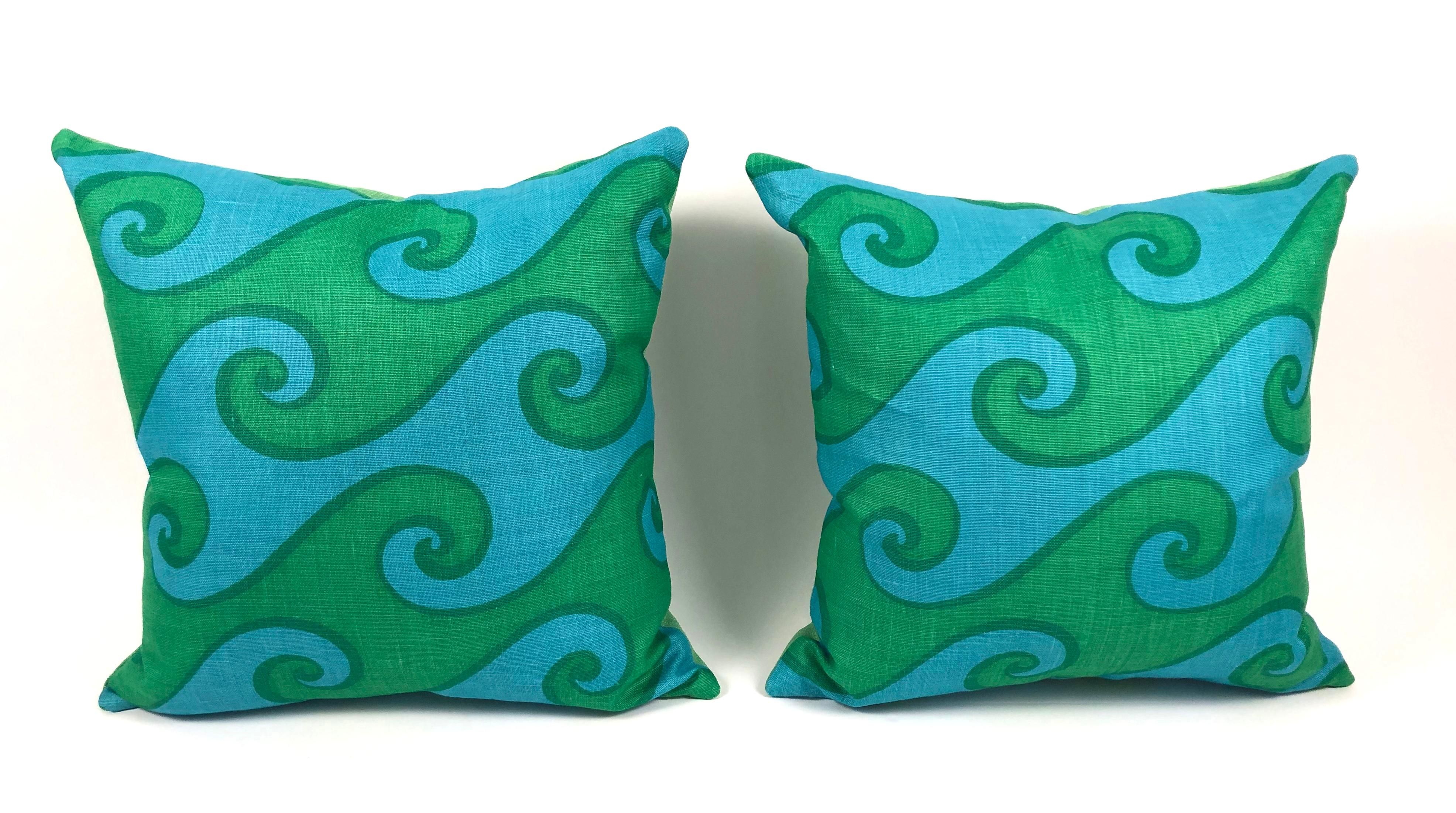 Vintage hand printed linen pillow in the Sea Scroll pattern, a vivid blue and green wave pattern by Elenhank. Sold individually. Made using original, mint condition fabric, with new down filled insert and green linen back. 

Elenhank was started by