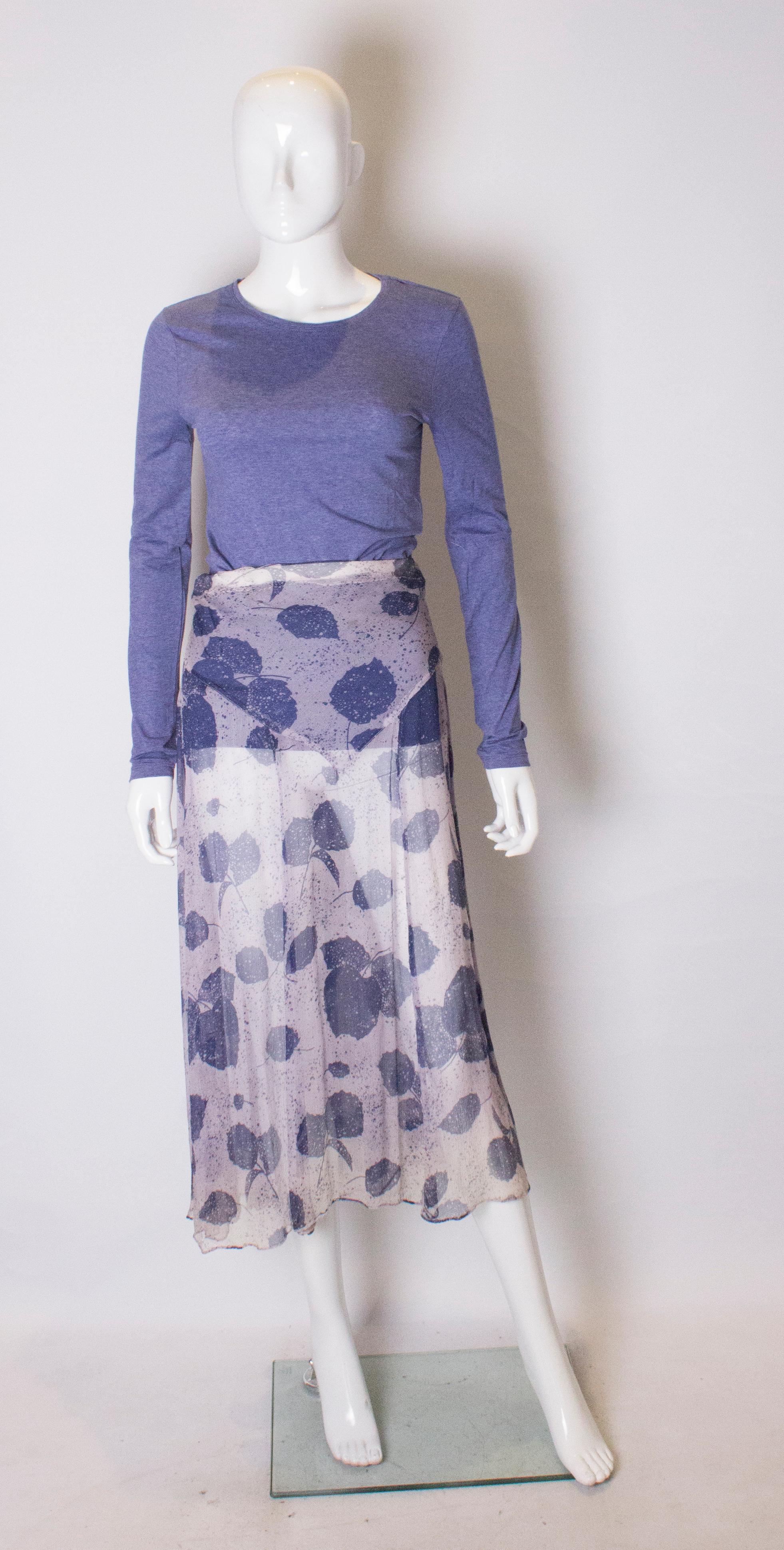 A pretty blue and ivory silk chiffon skirt. The skirt has an elasticated waist.