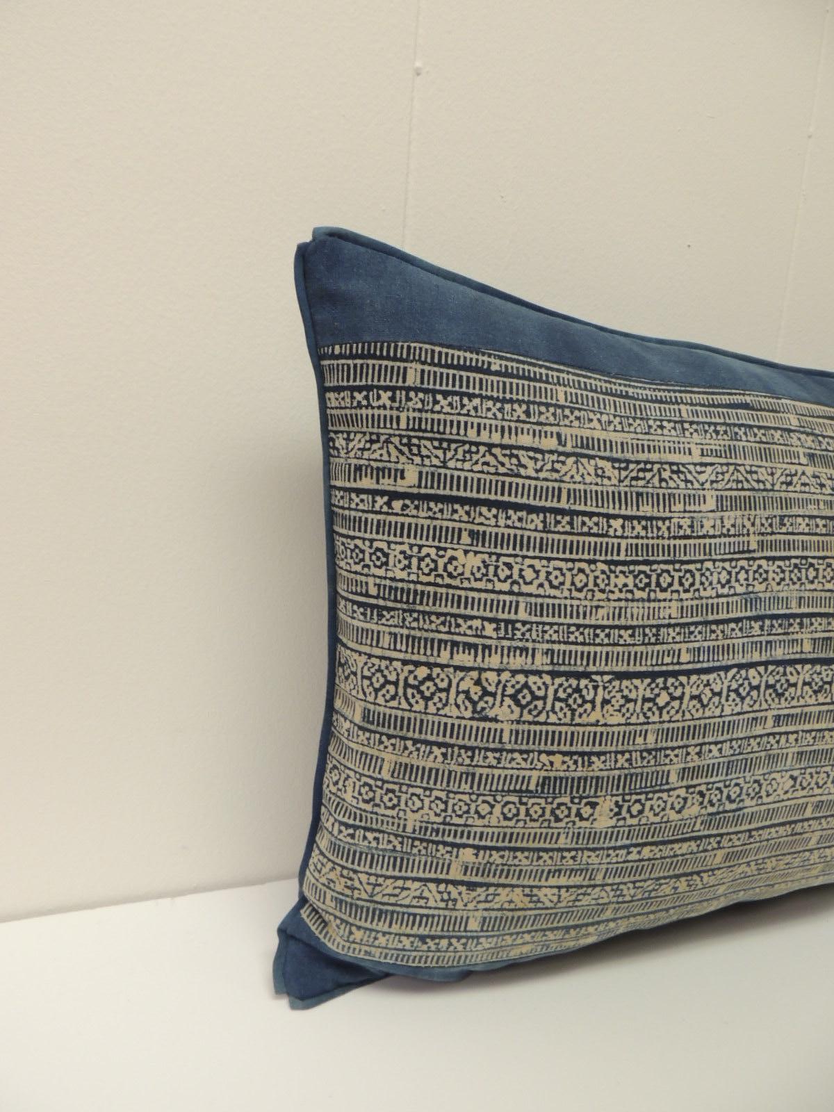 Vintage blue and natural hand-blocked tribal batik Lumbar decorative pillow, framed with same cotton textile and custom ATG blue flat trim.
Backed with slate blue woven linen.
Decorative pillow handcrafted and designed in the USA. Closure by