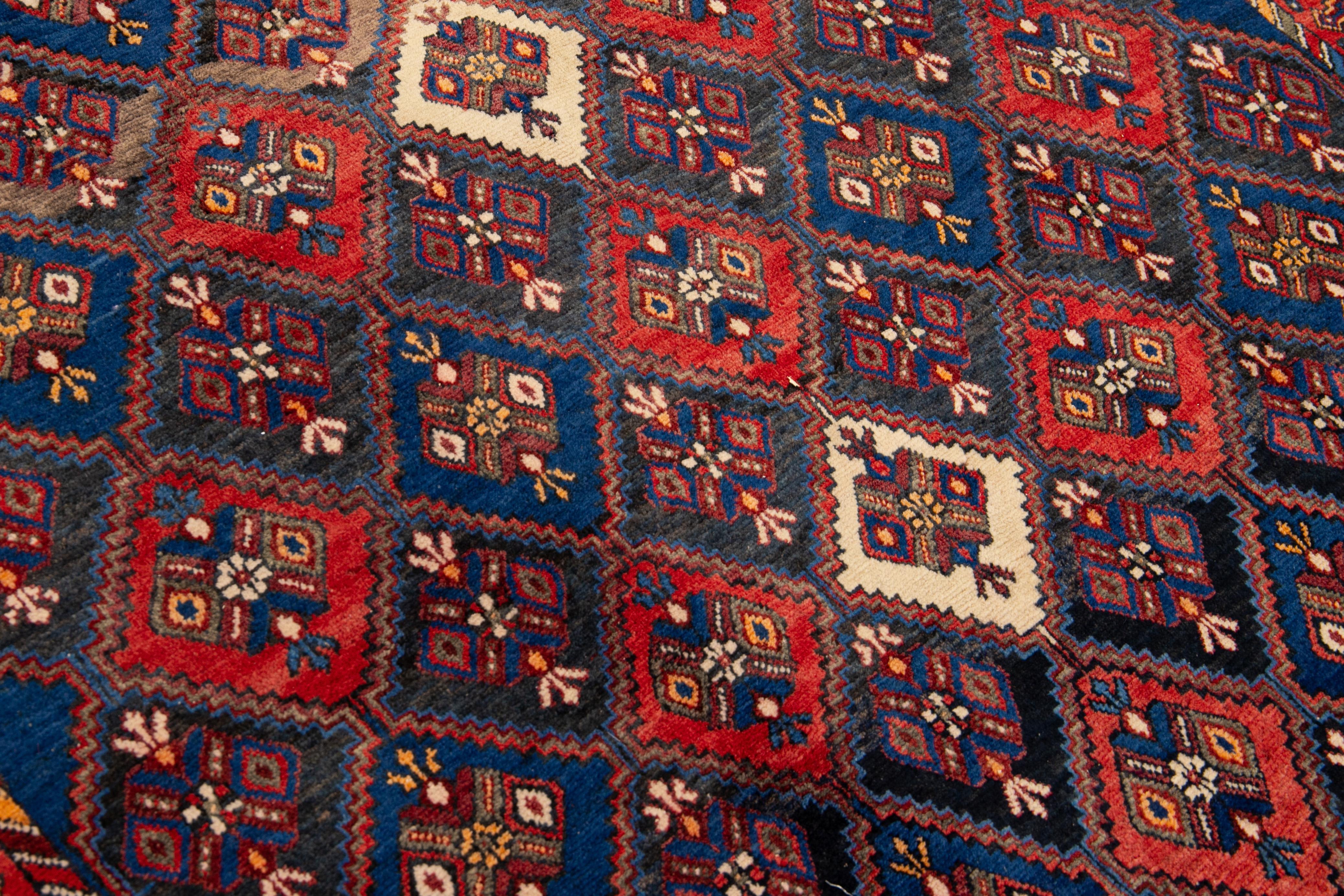 20th Century Vintage Blue and Red Persian Handmade Geometric Pattern Wool Rug For Sale
