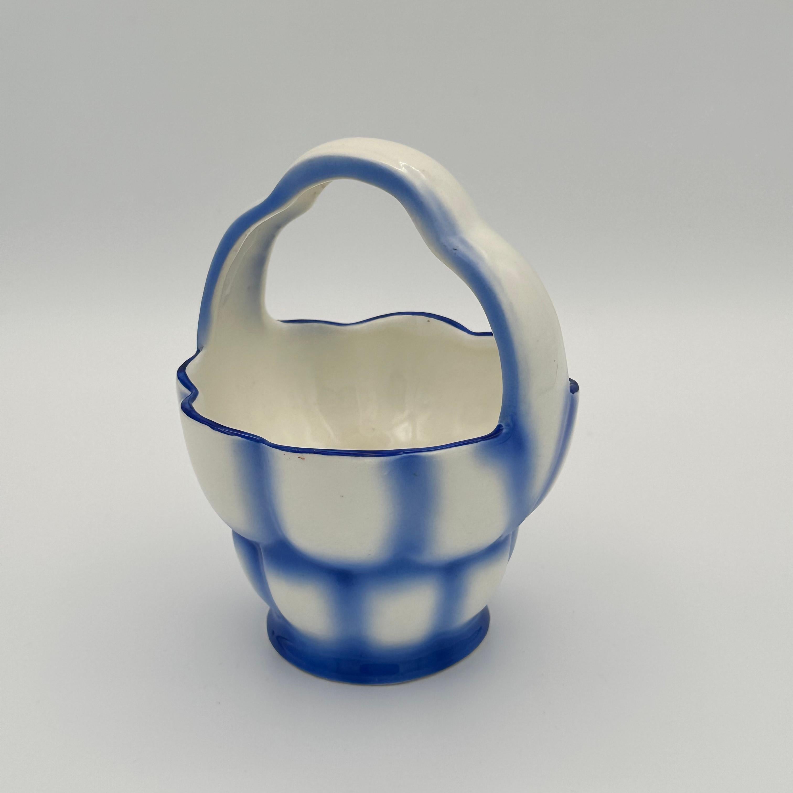 Vintage Blue and White Art Deco Spritzdekor Ceramic Basket from Czechoslovakia. This vessel is executed in the Art Deco 