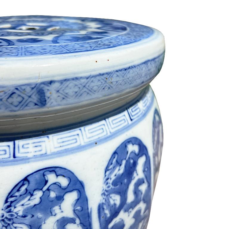 Vintage Blue and White Ceramic Chinoiserie Garden Stool With Floral Scroll Motif For Sale 4