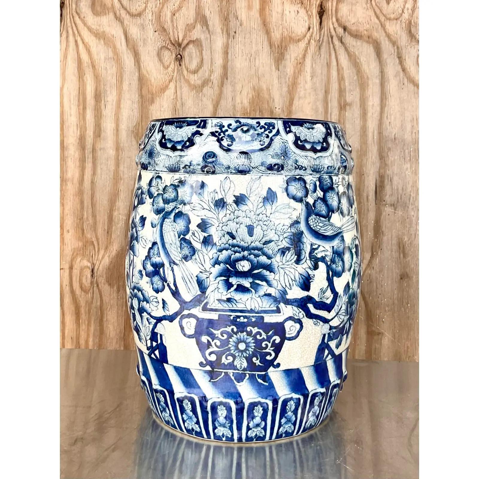 Gorgeous vintage blue and white garden stool. A beautiful Ming design in a chic glazed ceramic. Perfect indoors our outside. Sure to add some charm to any space. Acquired from a Palm Beach estate.