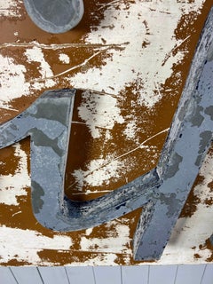 Blaues und weißes „Hairdressing“-Schild