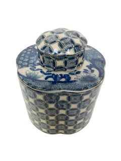 Vintage blue-and-white patterned pottery jar