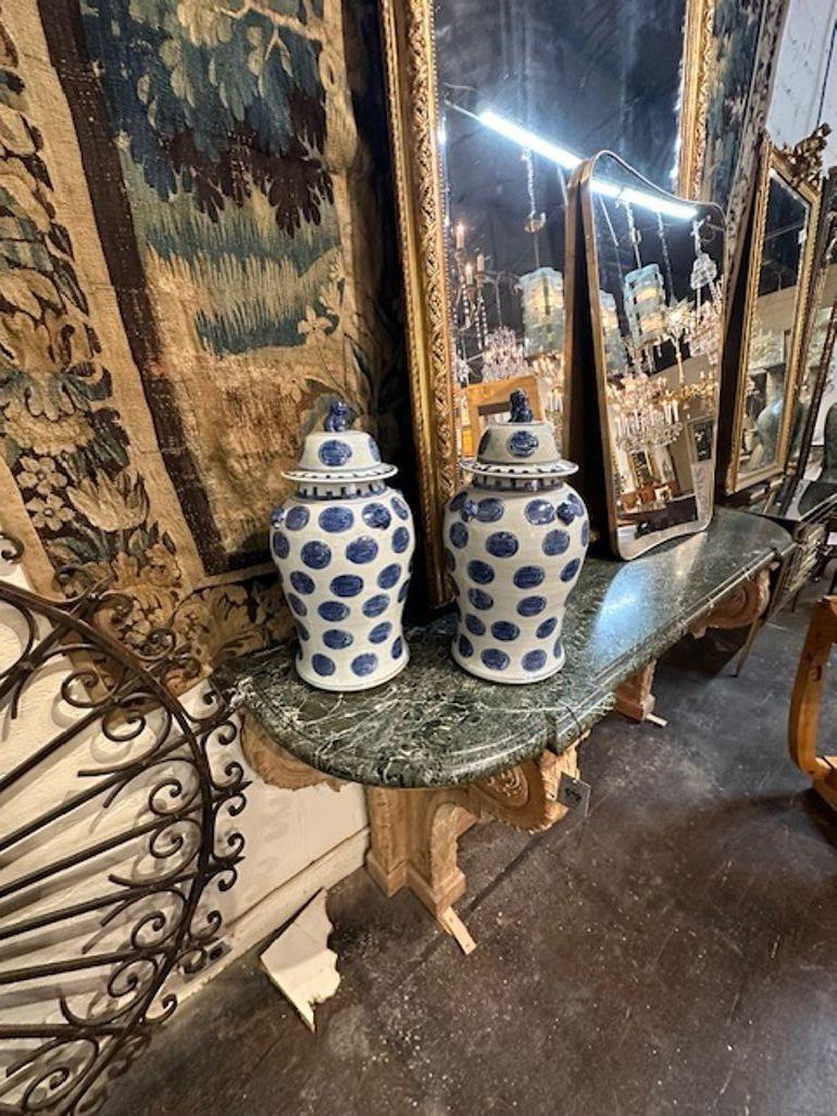 Pair of vintage Chinese blue and white porcelain vases. Circa 1920. A timeless and classic touch for a fine interior.