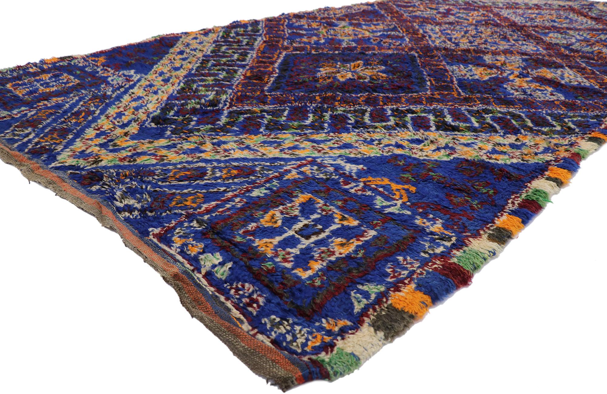 21331 Vintage Blue Moroccan Rug, 06'01 x 13'07. Modern style meets nomadic charm in this hand knotted wool blue Moroccan rug. The eye-catching tribal design and lively colors woven into this piece work together creating a rustic yet refined look.