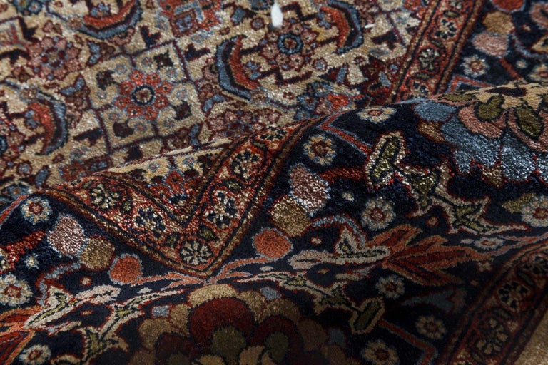 High-quality vintage blue, brown, red, and white silk rug
Size: 3'8