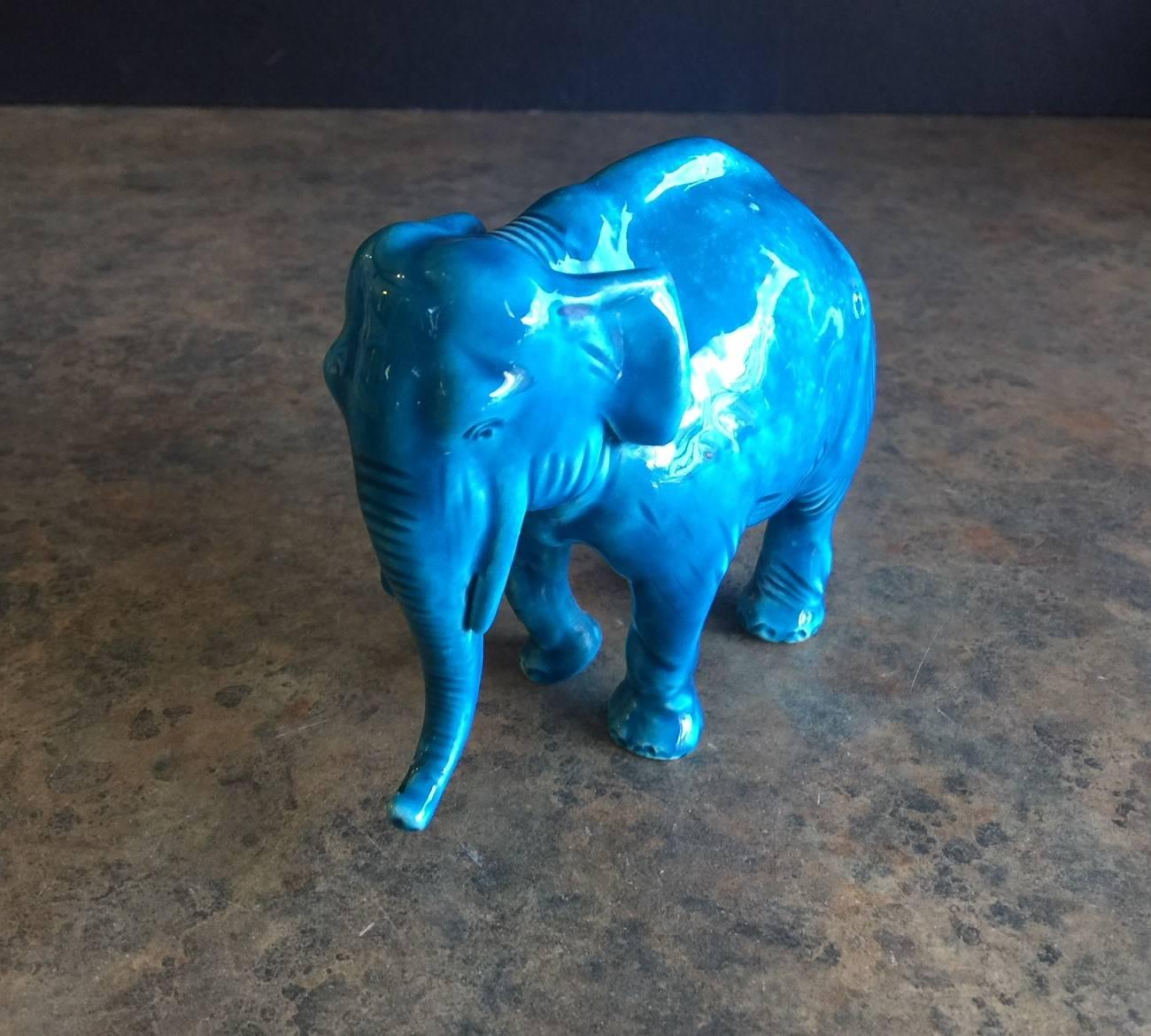 A very cool small, blue ceramic elephant by Sevres of France, circa 1960s. The piece is in excellent condition with no chips or cracks.