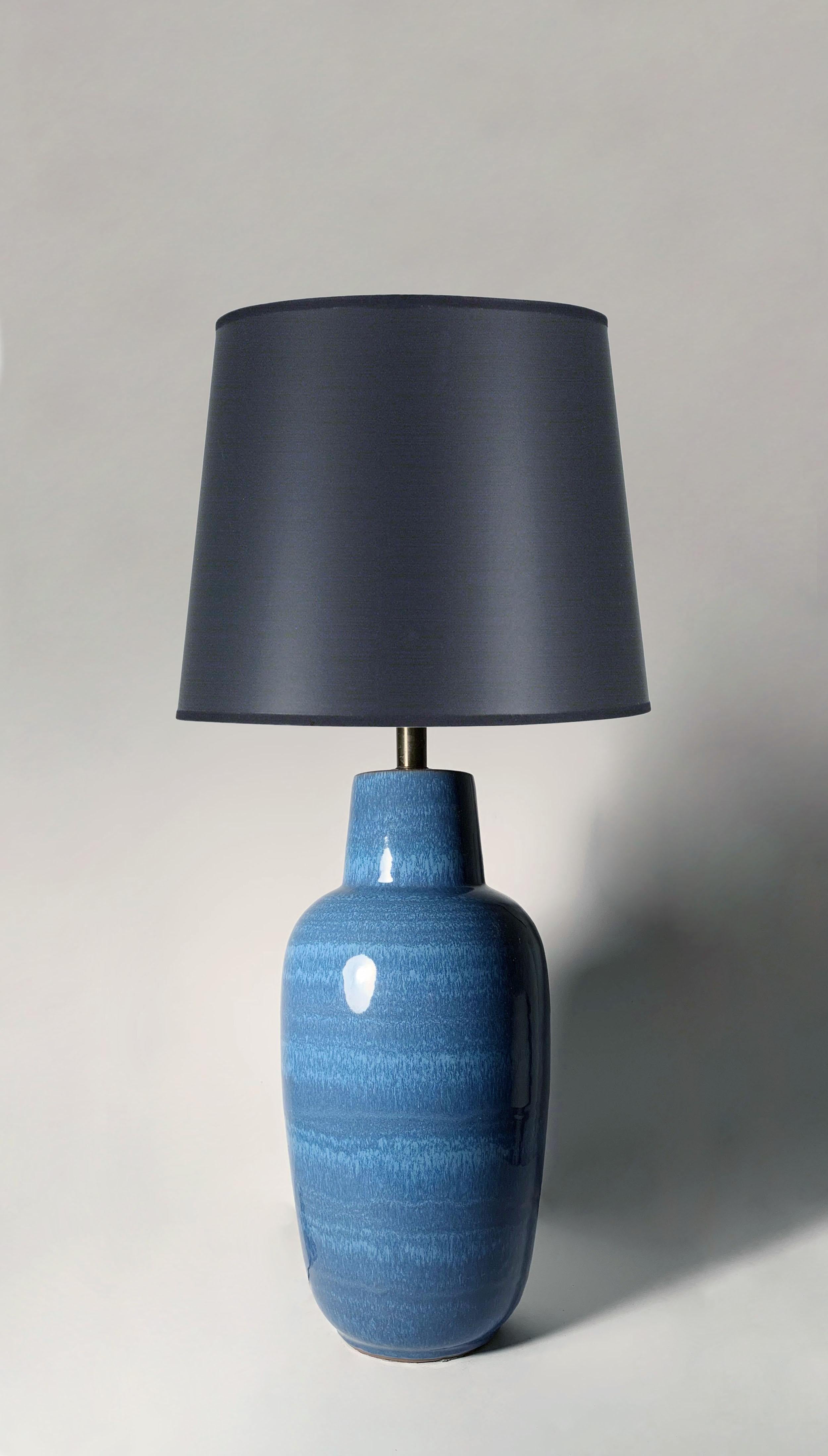 Vintage ceramic/pottery table lamp by Lee Rosen for Design Technics. Beautiful drip blue glaze on this one.

24