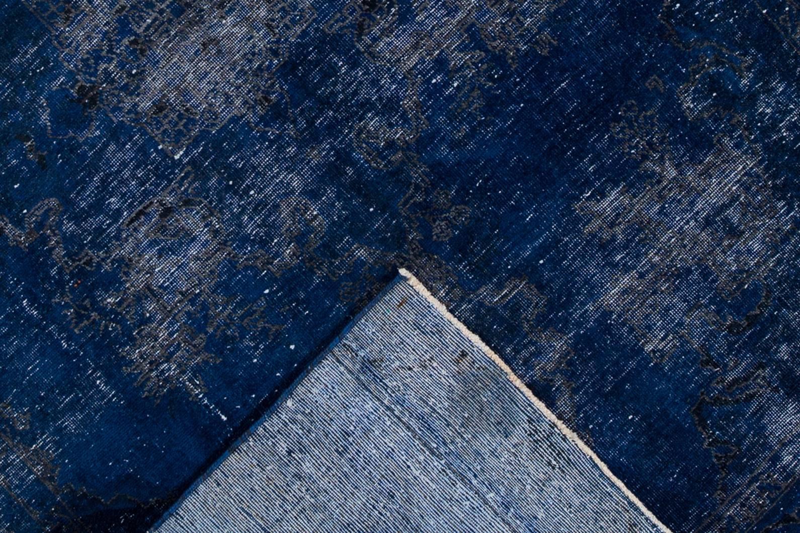 overdyed blue rug