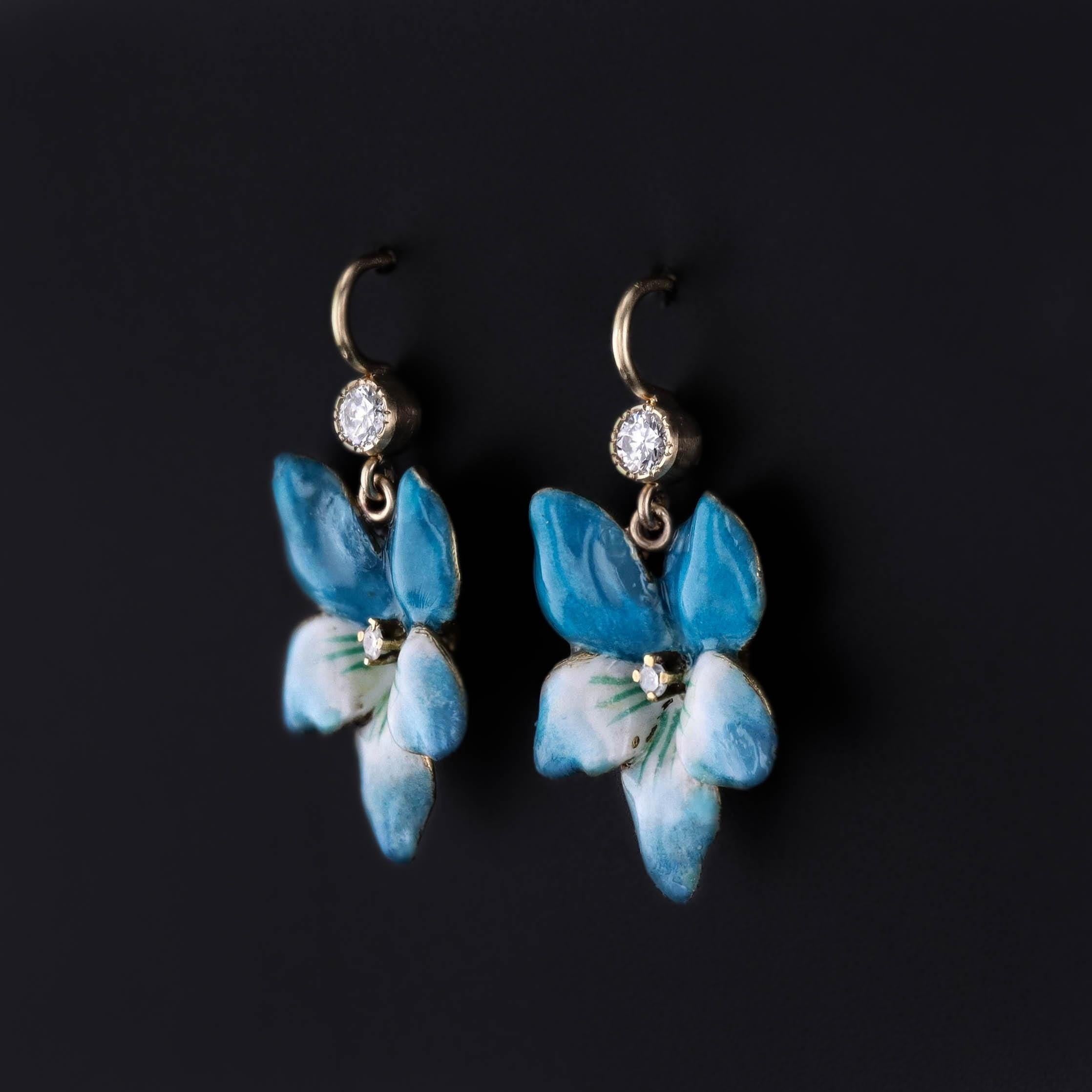 Vintage Violet Earrings: These earrings feature violet flowers of 14k gold with blue and white enamel and diamonds. They were created from vintage screw back earrings (circa 1940) that our jeweler transformed by adding diamond surmounts and 14k gold