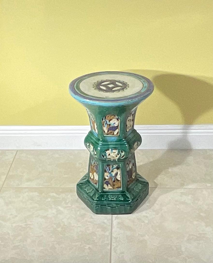 Vintage ceramic garden stool with openwork design, blue green turquoise glaze colors  ,  this ceramic garden stool charms us with its graceful round and geometric design and artful floral motifs , great addition to any room and garden 