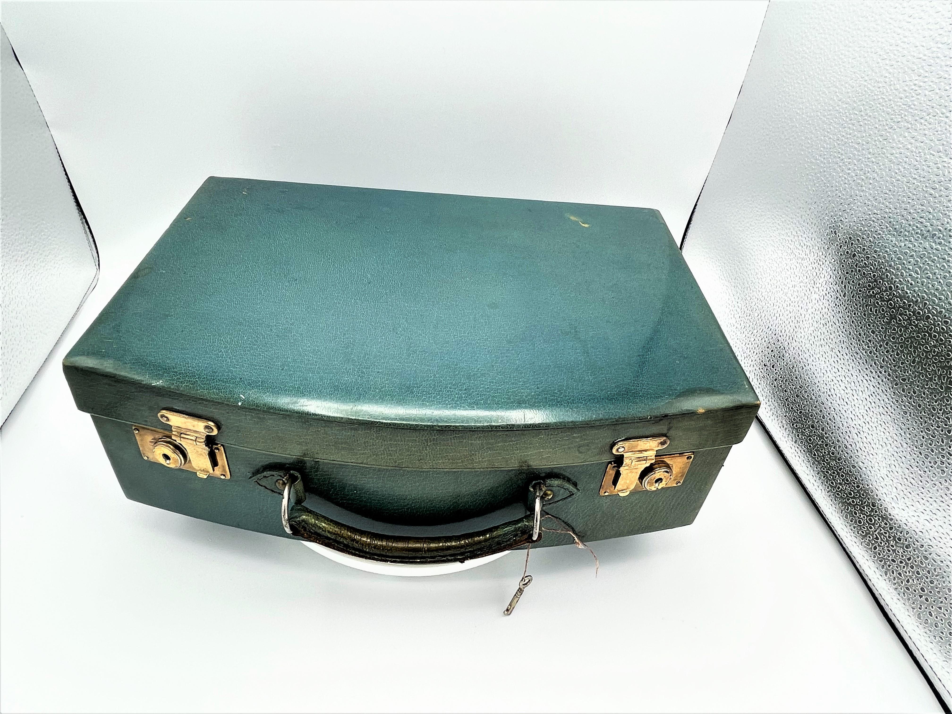 Beige Vintage blue/green leather beauty case, 9 blue enameled boxes, 19th C. Vienna 