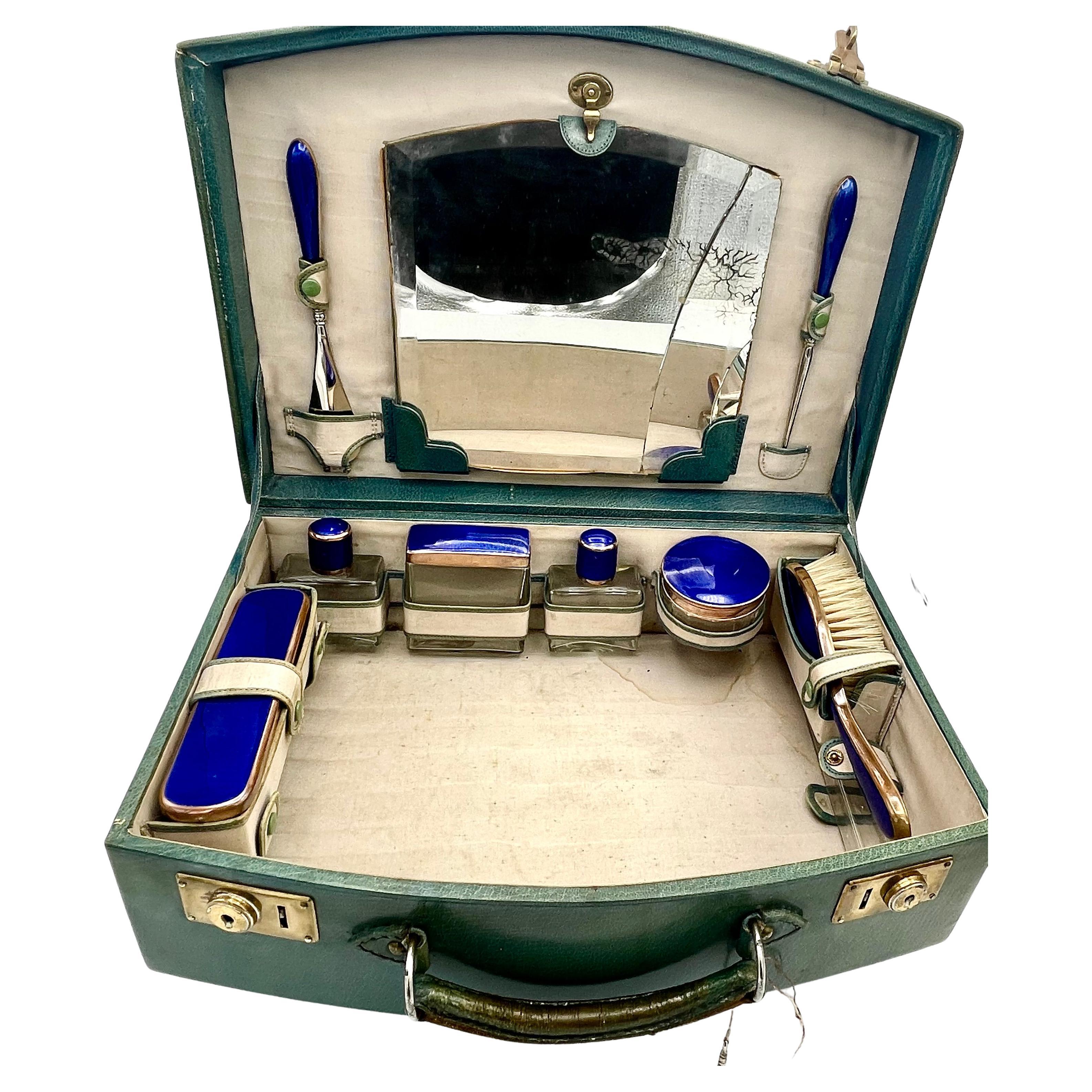 Vintage blue/green leather beauty case, 9 blue enameled boxes, 19th C. Vienna 